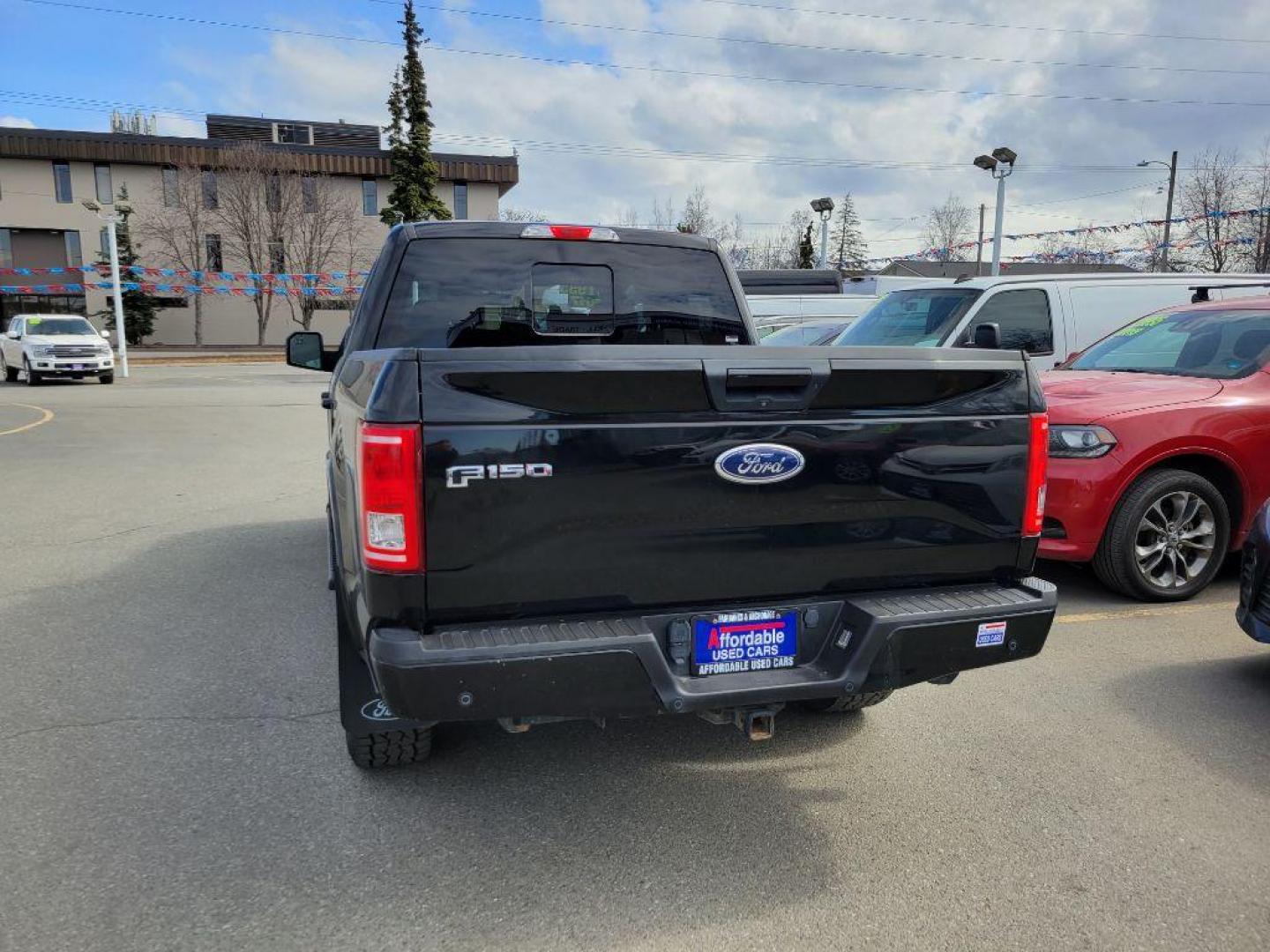 2017 BLACK FORD F150 SUPERCREW (1FTEW1EP3HF) with an 2.7L engine, Automatic transmission, located at 929 East 8th Ave, Anchorage, AK, 99501, (907) 274-2277, 61.214783, -149.866074 - Photo#2