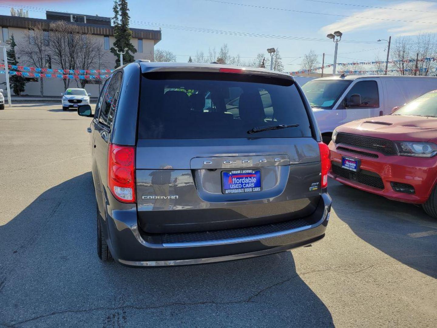 2019 GREY DODGE GRAND CARAVAN SXT (2C4RDGCG6KR) with an 3.6L engine, Automatic transmission, located at 929 East 8th Ave, Anchorage, AK, 99501, (907) 274-2277, 61.214783, -149.866074 - Photo#2