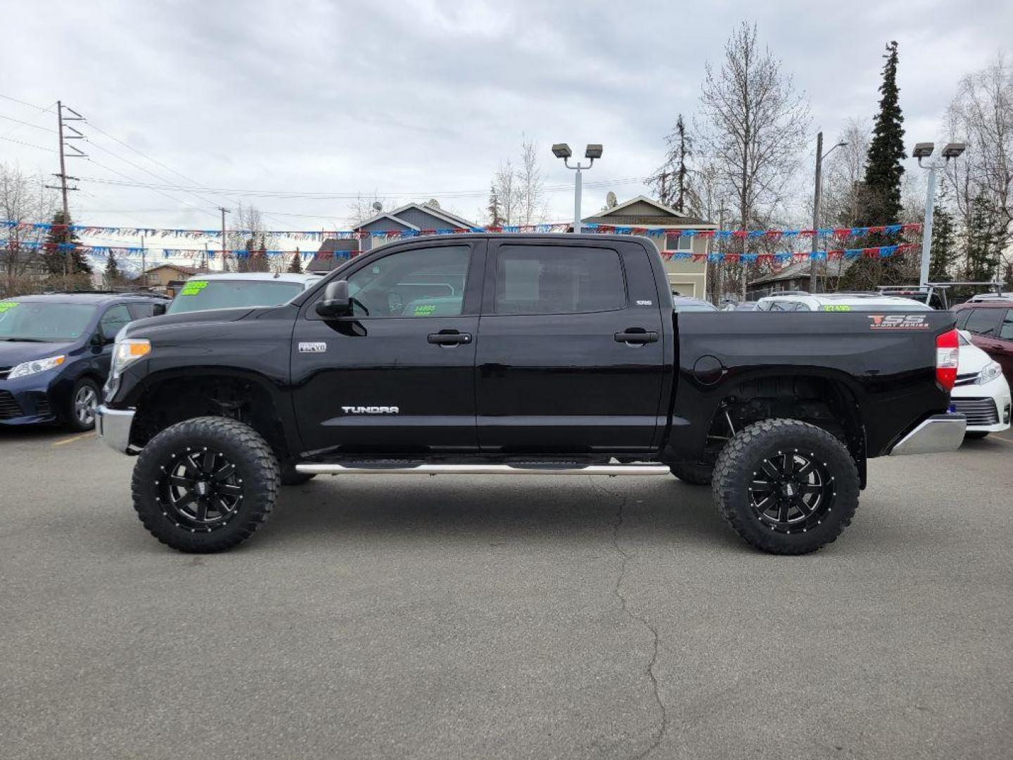 2017 BLACK TOYOTA TUNDRA CREWMAX SR5 (5TFDW5F11HX) with an 5.7L engine, Automatic transmission, located at 929 East 8th Ave, Anchorage, AK, 99501, (907) 274-2277, 61.214783, -149.866074 - Photo#1