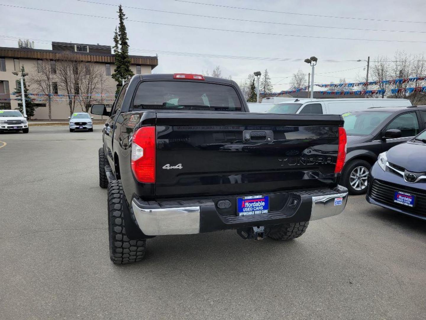 2017 BLACK TOYOTA TUNDRA CREWMAX SR5 (5TFDW5F11HX) with an 5.7L engine, Automatic transmission, located at 929 East 8th Ave, Anchorage, AK, 99501, (907) 274-2277, 61.214783, -149.866074 - Photo#2