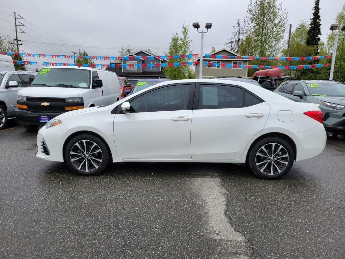 2017 WHITE TOYOTA COROLLA L (5YFBURHE8HP) with an 1.8L engine, Continuously Variable transmission, located at 929 East 8th Ave, Anchorage, AK, 99501, (907) 274-2277, 61.214783, -149.866074 - Photo#1