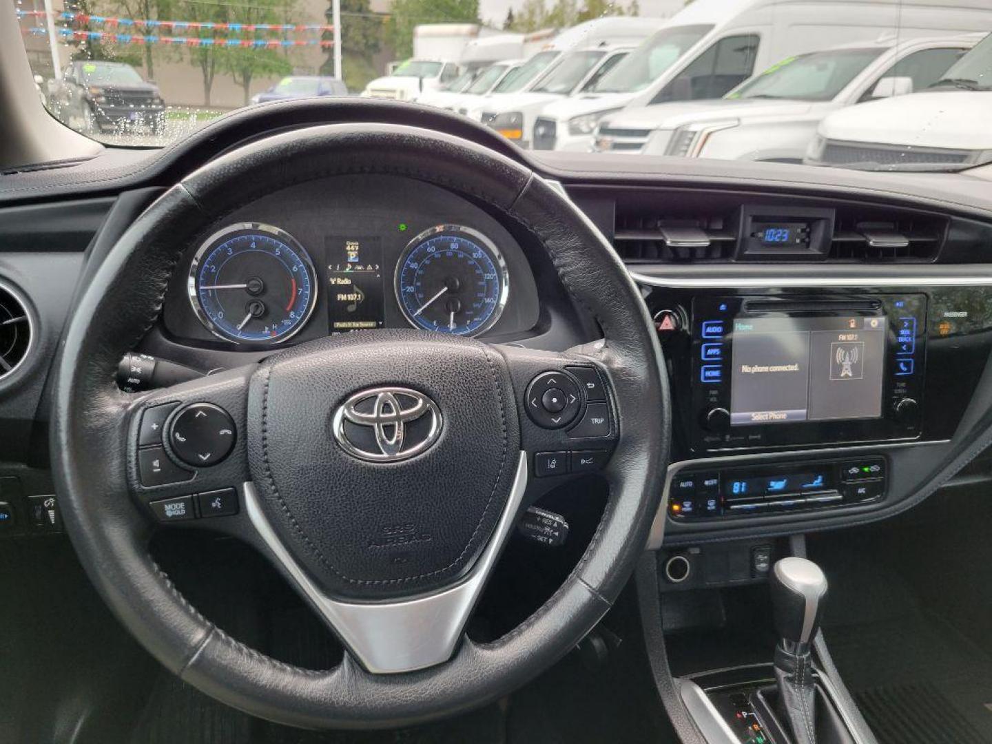 2017 WHITE TOYOTA COROLLA L (5YFBURHE8HP) with an 1.8L engine, Continuously Variable transmission, located at 929 East 8th Ave, Anchorage, AK, 99501, (907) 274-2277, 61.214783, -149.866074 - Photo#4