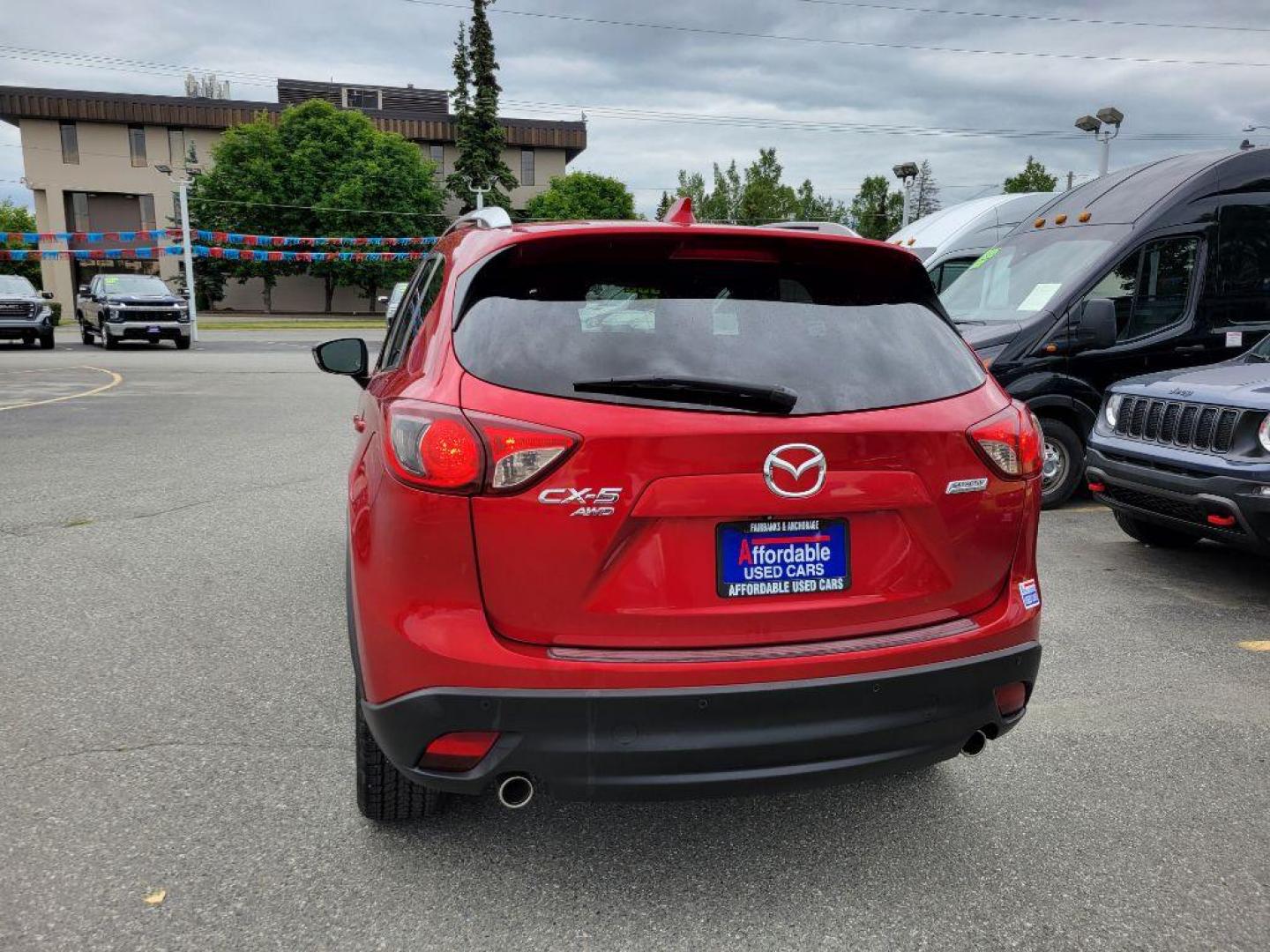 2014 RED MAZDA CX-5 GT (JM3KE4DY0E0) with an 2.5L engine, Automatic transmission, located at 929 East 8th Ave, Anchorage, AK, 99501, (907) 274-2277, 61.214783, -149.866074 - Photo#2