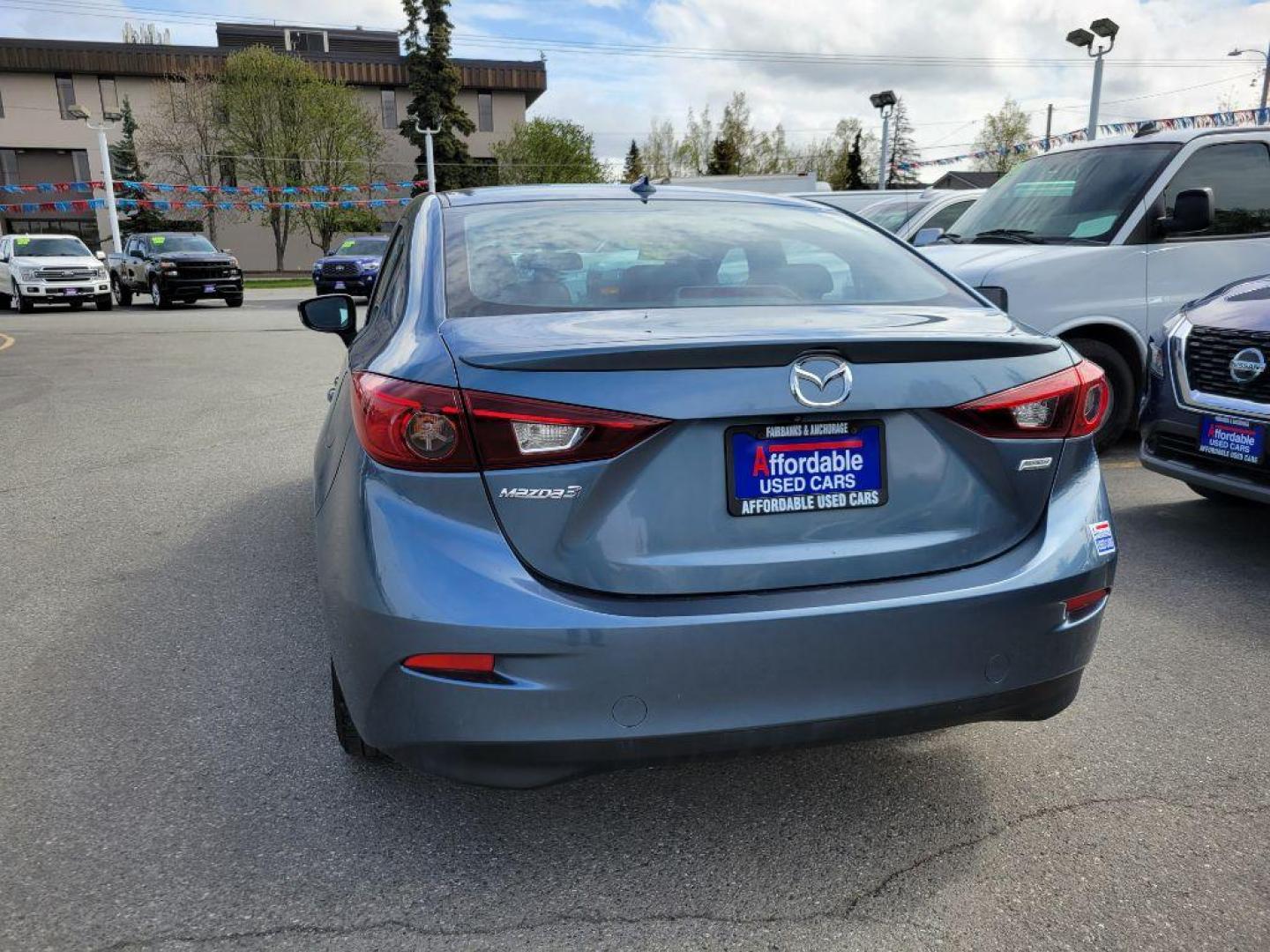 2016 BLUE MAZDA 3 GRAND TOURING (JM1BM1X77G1) with an 2.0L engine, Automatic transmission, located at 929 East 8th Ave, Anchorage, AK, 99501, (907) 274-2277, 61.214783, -149.866074 - Photo#2