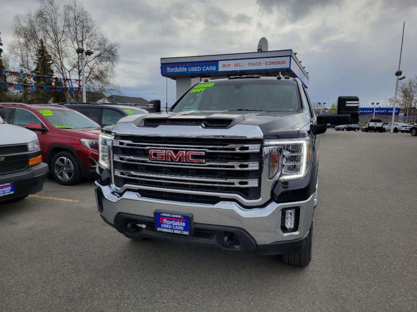 2021 BLACK GMC SIERRA 2500 SLE (1GT49ME71MF) with an 6.6L engine, Automatic transmission, located at 929 East 8th Ave, Anchorage, AK, 99501, (907) 274-2277, 61.214783, -149.866074 - Photo#0