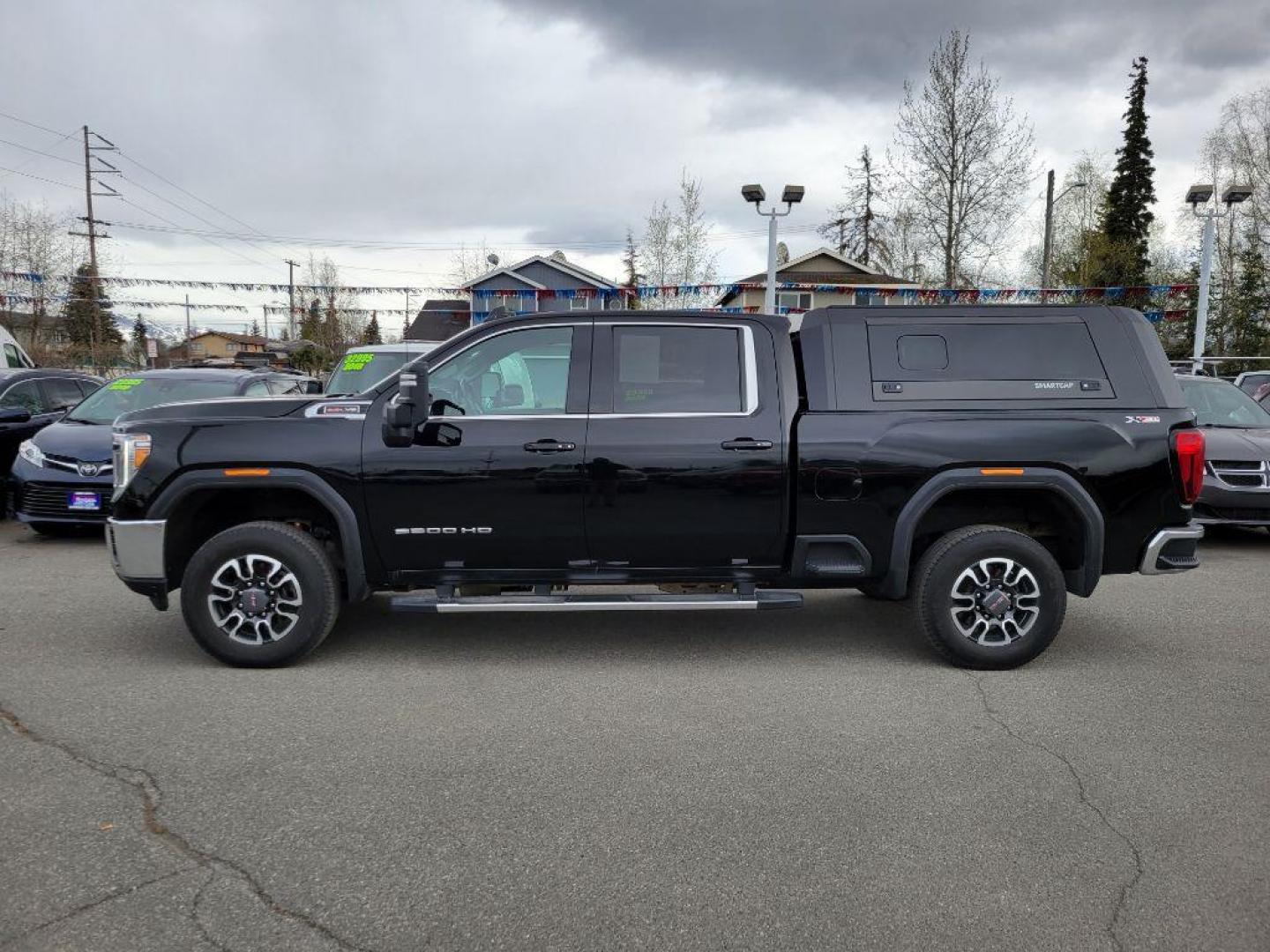 2021 BLACK GMC SIERRA 2500 SLE (1GT49ME71MF) with an 6.6L engine, Automatic transmission, located at 929 East 8th Ave, Anchorage, AK, 99501, (907) 274-2277, 61.214783, -149.866074 - Photo#1