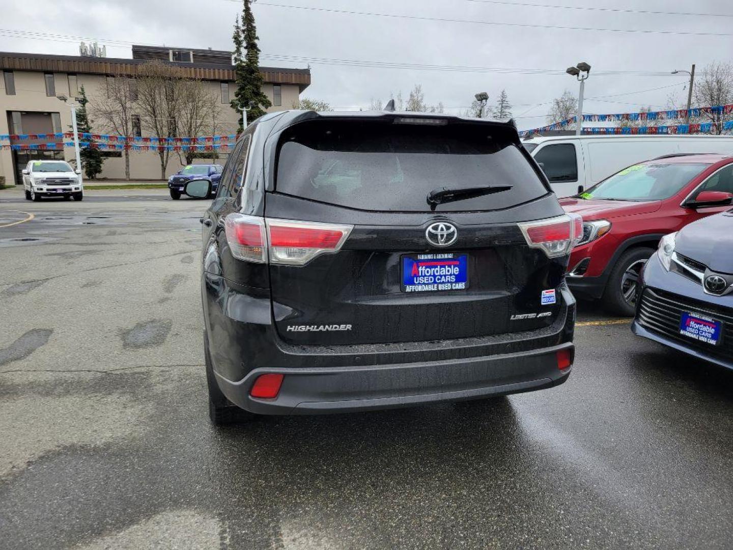 2016 BLACK TOYOTA HIGHLANDER LIMITED (5TDDKRFH7GS) with an 3.5L engine, Automatic transmission, located at 929 East 8th Ave, Anchorage, AK, 99501, (907) 274-2277, 61.214783, -149.866074 - Photo#2