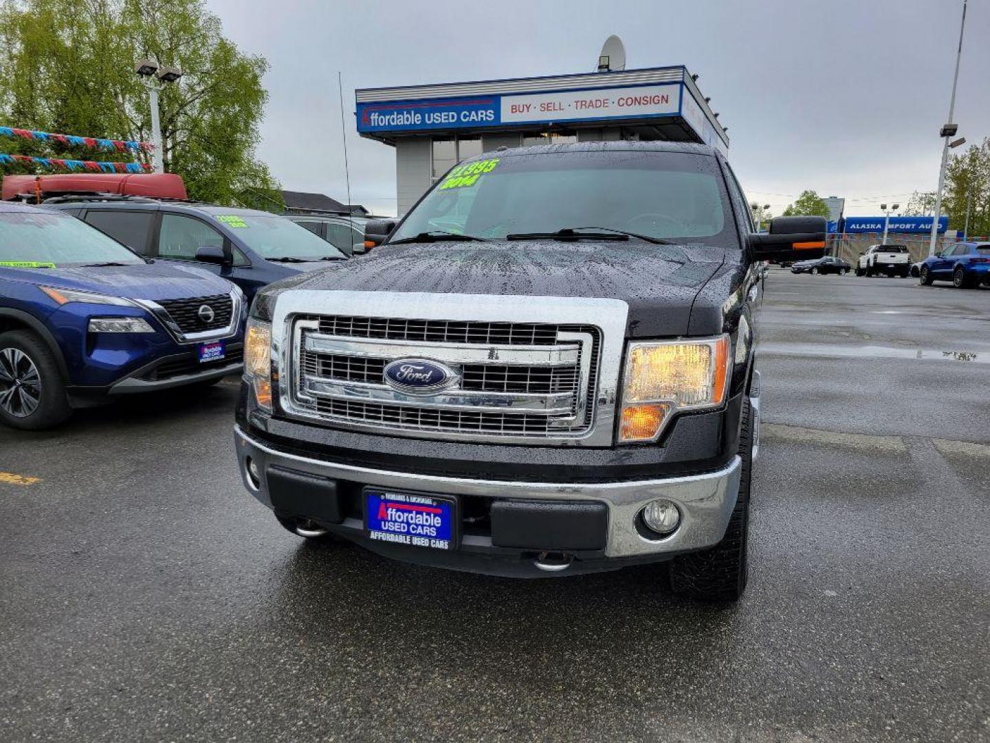 2014 BLACK FORD F150 SUPERCREW (1FTFW1EF0EK) with an 5.0L engine, Automatic transmission, located at 929 East 8th Ave, Anchorage, AK, 99501, (907) 274-2277, 61.214783, -149.866074 - Photo#0