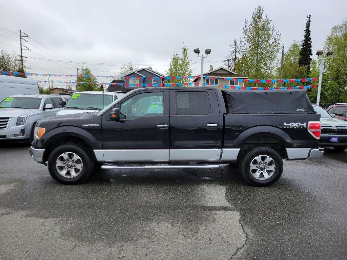 2014 BLACK FORD F150 SUPERCREW (1FTFW1EF0EK) with an 5.0L engine, Automatic transmission, located at 929 East 8th Ave, Anchorage, AK, 99501, (907) 274-2277, 61.214783, -149.866074 - Photo#1