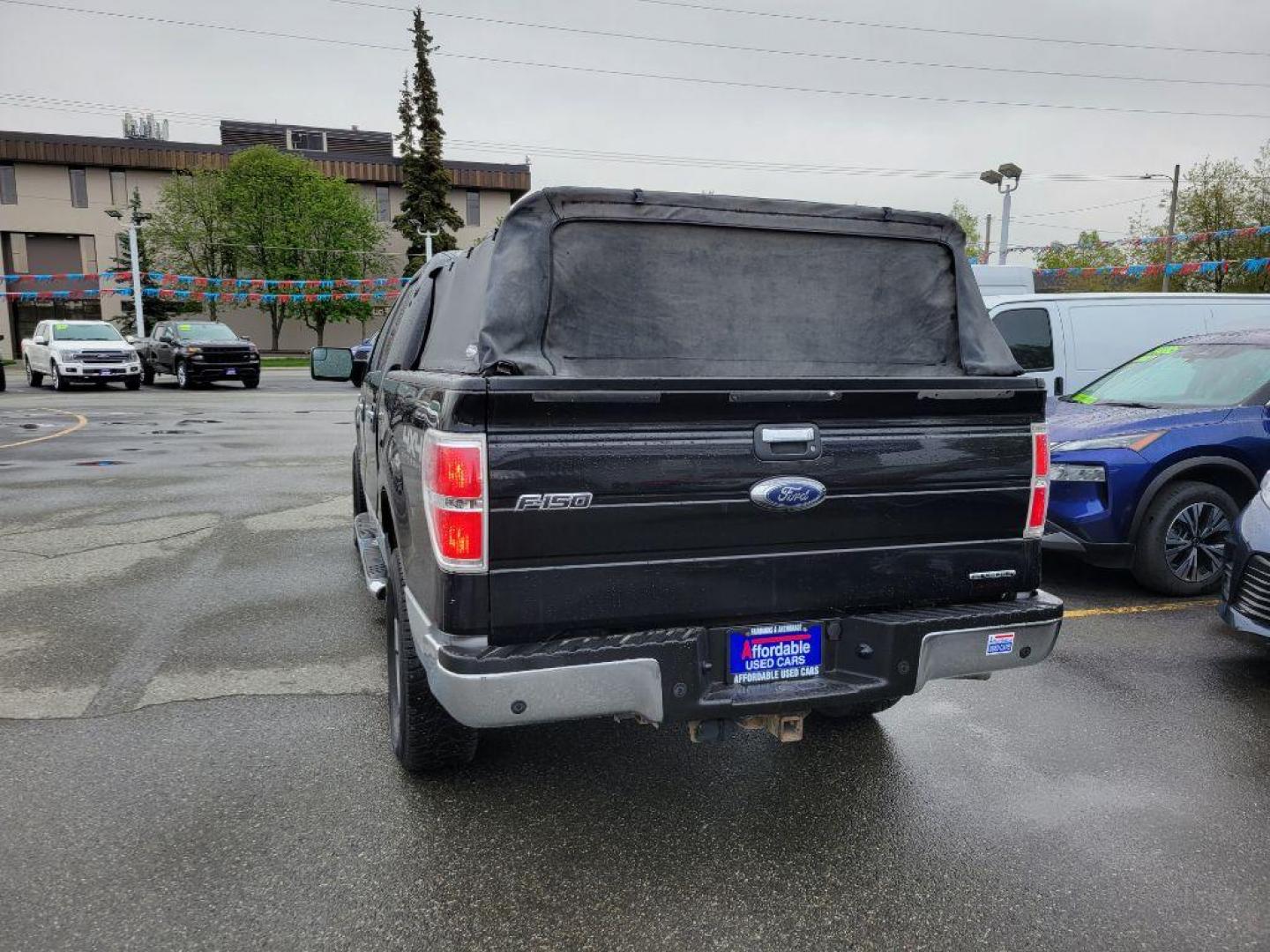 2014 BLACK FORD F150 SUPERCREW (1FTFW1EF0EK) with an 5.0L engine, Automatic transmission, located at 929 East 8th Ave, Anchorage, AK, 99501, (907) 274-2277, 61.214783, -149.866074 - Photo#2