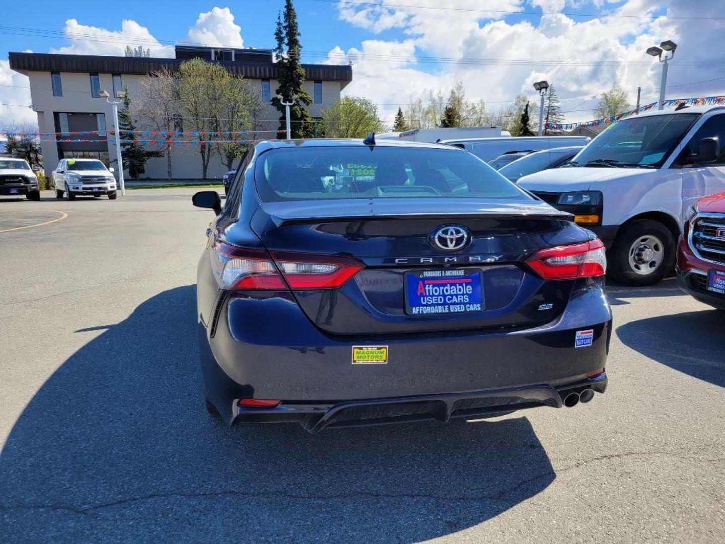 2021 BLUE TOYOTA CAMRY SE (4T1G11AK9MU) with an 2.5L engine, Automatic transmission, located at 929 East 8th Ave, Anchorage, AK, 99501, (907) 274-2277, 61.214783, -149.866074 - Photo#2