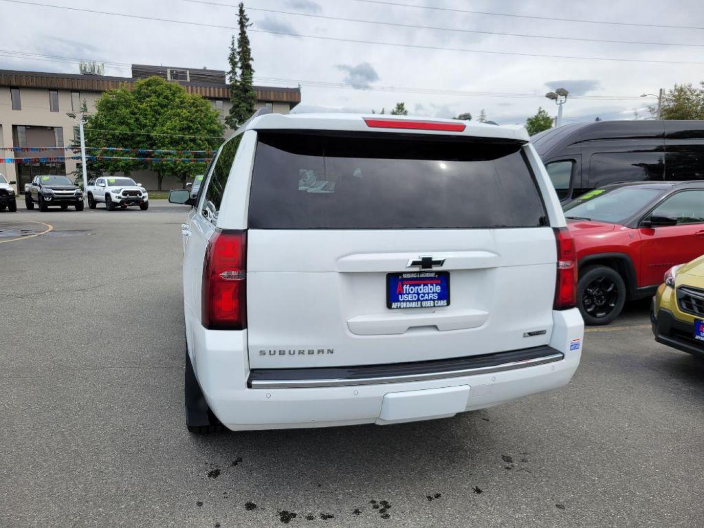 2017 WHITE CHEVROLET SUBURBAN 1500 PREMIER (1GNSKJKC3HR) with an 5.3L engine, Automatic transmission, located at 929 East 8th Ave, Anchorage, AK, 99501, (907) 274-2277, 61.214783, -149.866074 - Photo#2