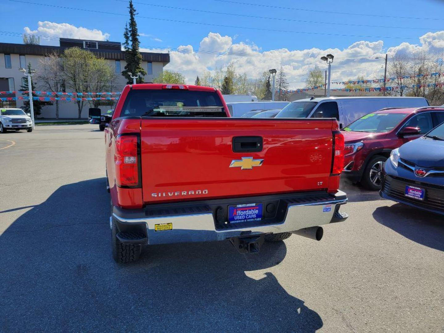 2019 RED CHEVROLET SILVERADO 2500 HEAVY DUTY LT (1GC1KSEY5KF) with an 6.6L engine, Automatic transmission, located at 929 East 8th Ave, Anchorage, AK, 99501, (907) 274-2277, 61.214783, -149.866074 - Photo#2