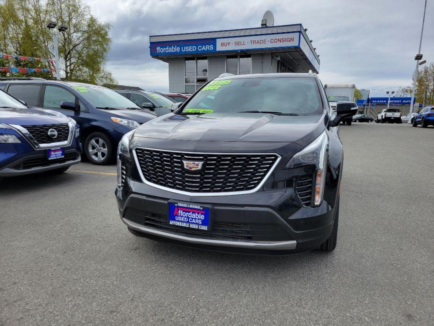 2022 BLACK CADILLAC XT4 PREMIUM LUXURY (1GYFZDR44NF) with an 2.0L engine, Automatic transmission, located at 929 East 8th Ave, Anchorage, AK, 99501, (907) 274-2277, 61.214783, -149.866074 - Photo#0