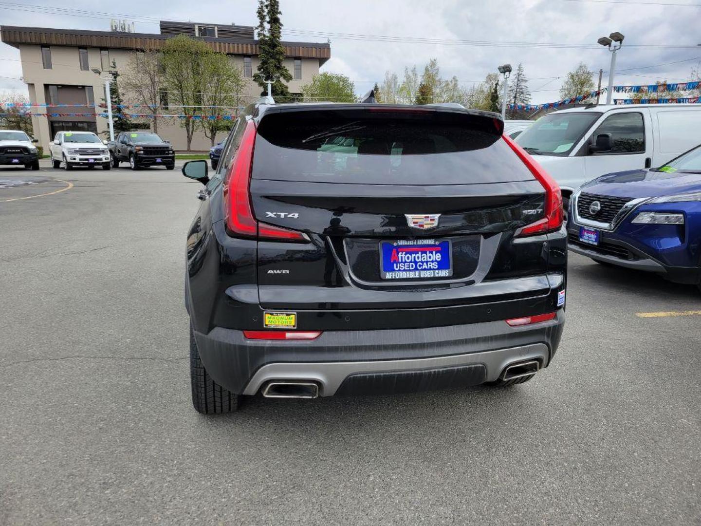 2022 BLACK CADILLAC XT4 PREMIUM LUXURY (1GYFZDR44NF) with an 2.0L engine, Automatic transmission, located at 929 East 8th Ave, Anchorage, AK, 99501, (907) 274-2277, 61.214783, -149.866074 - Photo#2