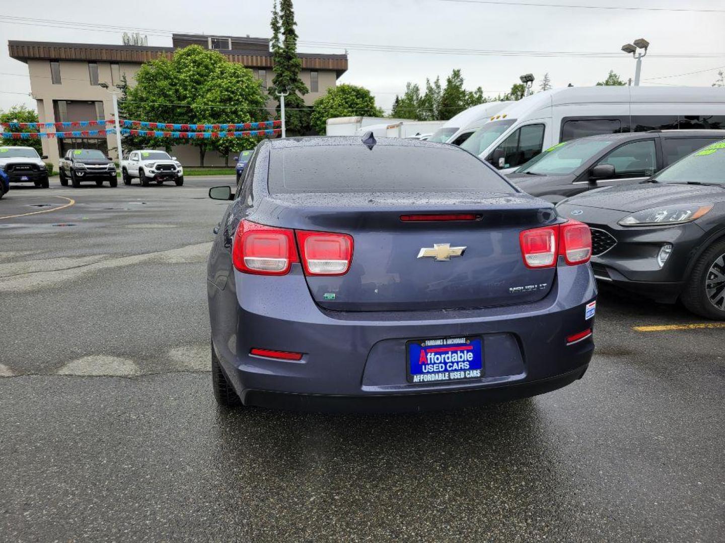 2015 BLUE CHEVROLET MALIBU 2LT (1G11D5SL5FF) with an 2.5L engine, Automatic transmission, located at 929 East 8th Ave, Anchorage, AK, 99501, (907) 274-2277, 61.214783, -149.866074 - Photo#2