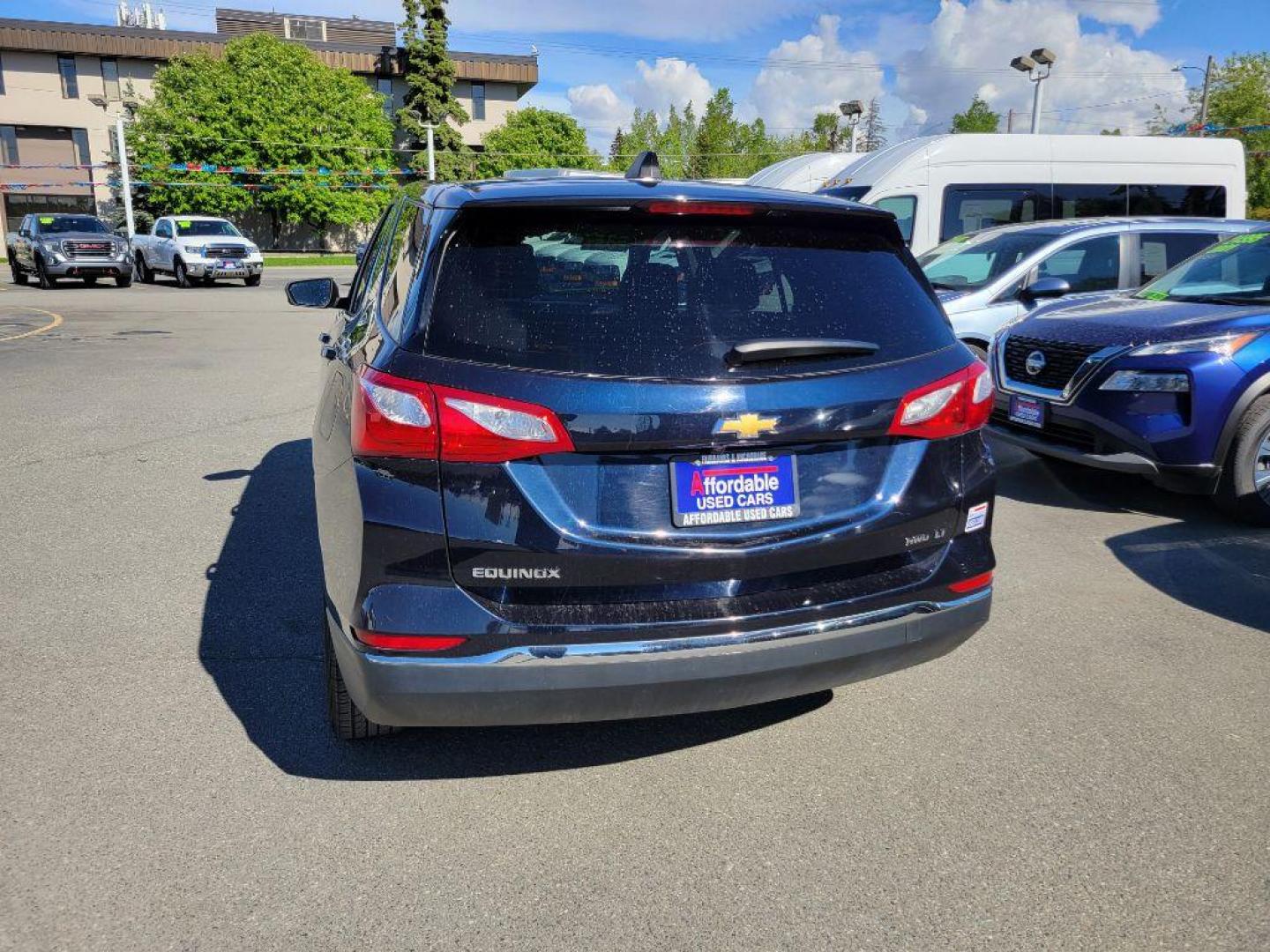 2021 GRAY CHEVROLET EQUINOX LT (3GNAXUEV5MS) with an 1.5L engine, Automatic transmission, located at 929 East 8th Ave, Anchorage, AK, 99501, (907) 274-2277, 61.214783, -149.866074 - Photo#2