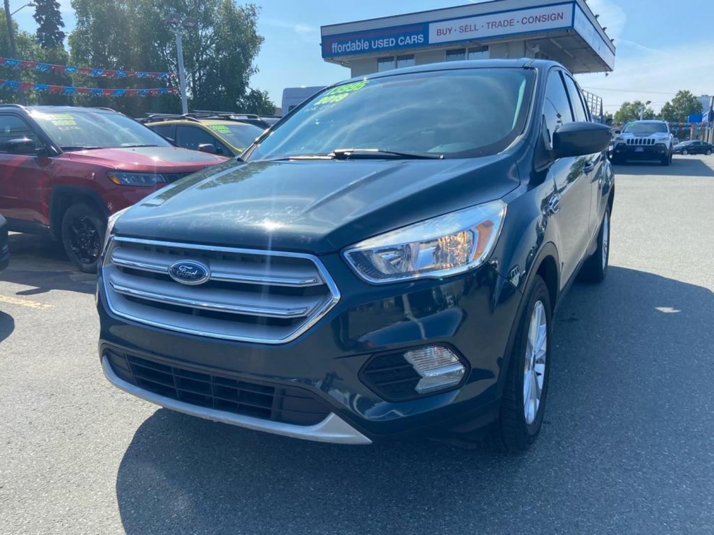 2019 GRAY FORD ESCAPE SE (1FMCU9GD3KU) with an 1.5L engine, Automatic transmission, located at 929 East 8th Ave, Anchorage, AK, 99501, (907) 274-2277, 61.214783, -149.866074 - Photo#0