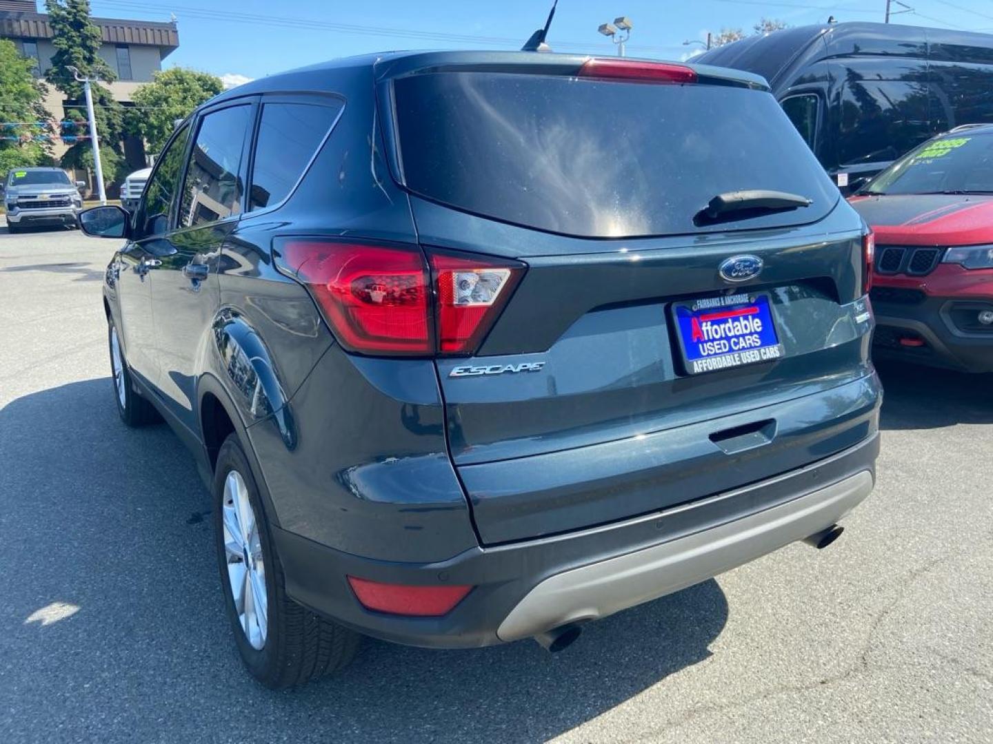 2019 GRAY FORD ESCAPE SE (1FMCU9GD3KU) with an 1.5L engine, Automatic transmission, located at 929 East 8th Ave, Anchorage, AK, 99501, (907) 274-2277, 61.214783, -149.866074 - Photo#2