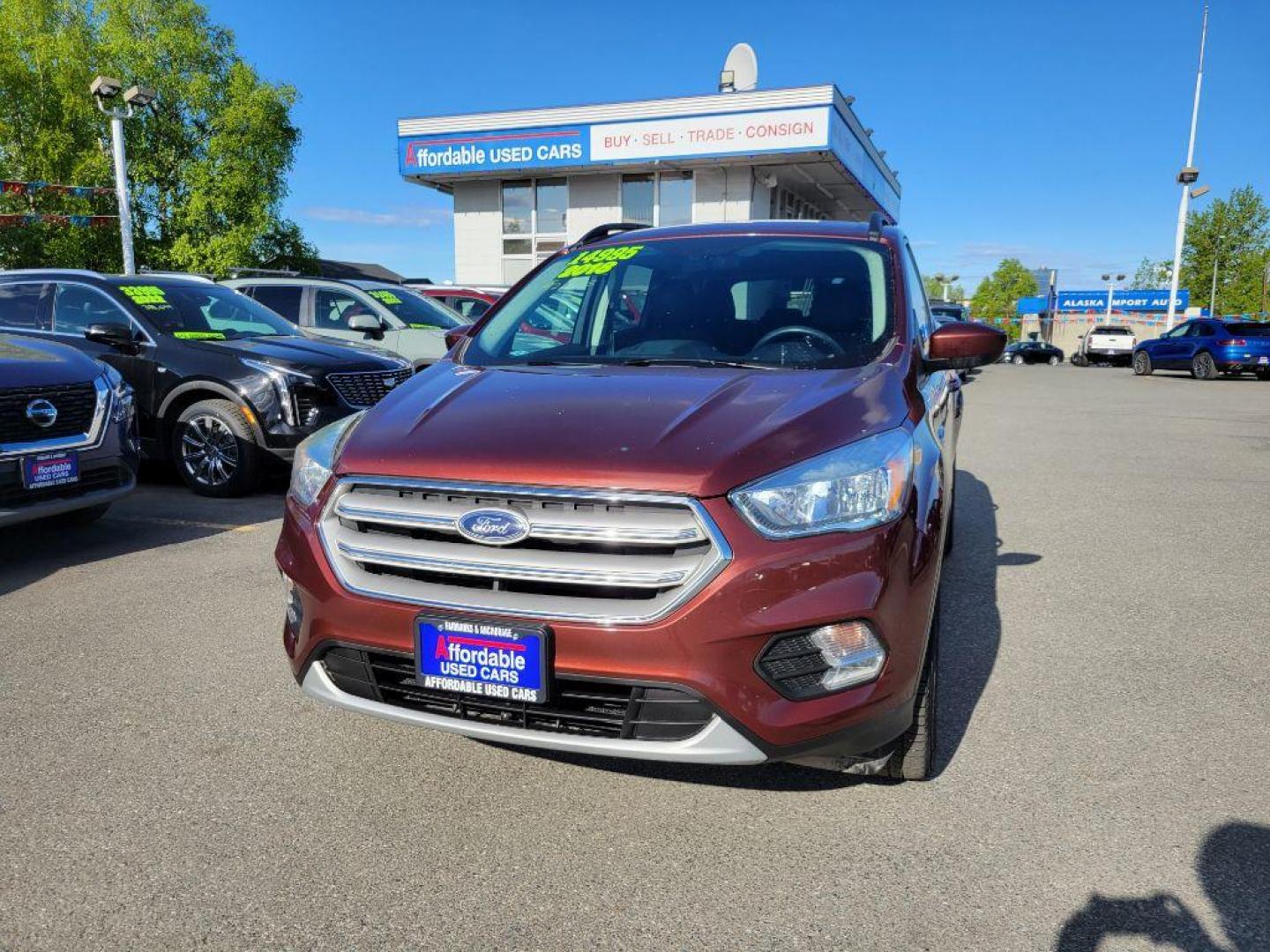 2018 MAROON FORD ESCAPE SE (1FMCU9GD5JU) with an 1.5L engine, Automatic transmission, located at 929 East 8th Ave, Anchorage, AK, 99501, (907) 274-2277, 61.214783, -149.866074 - Photo#0