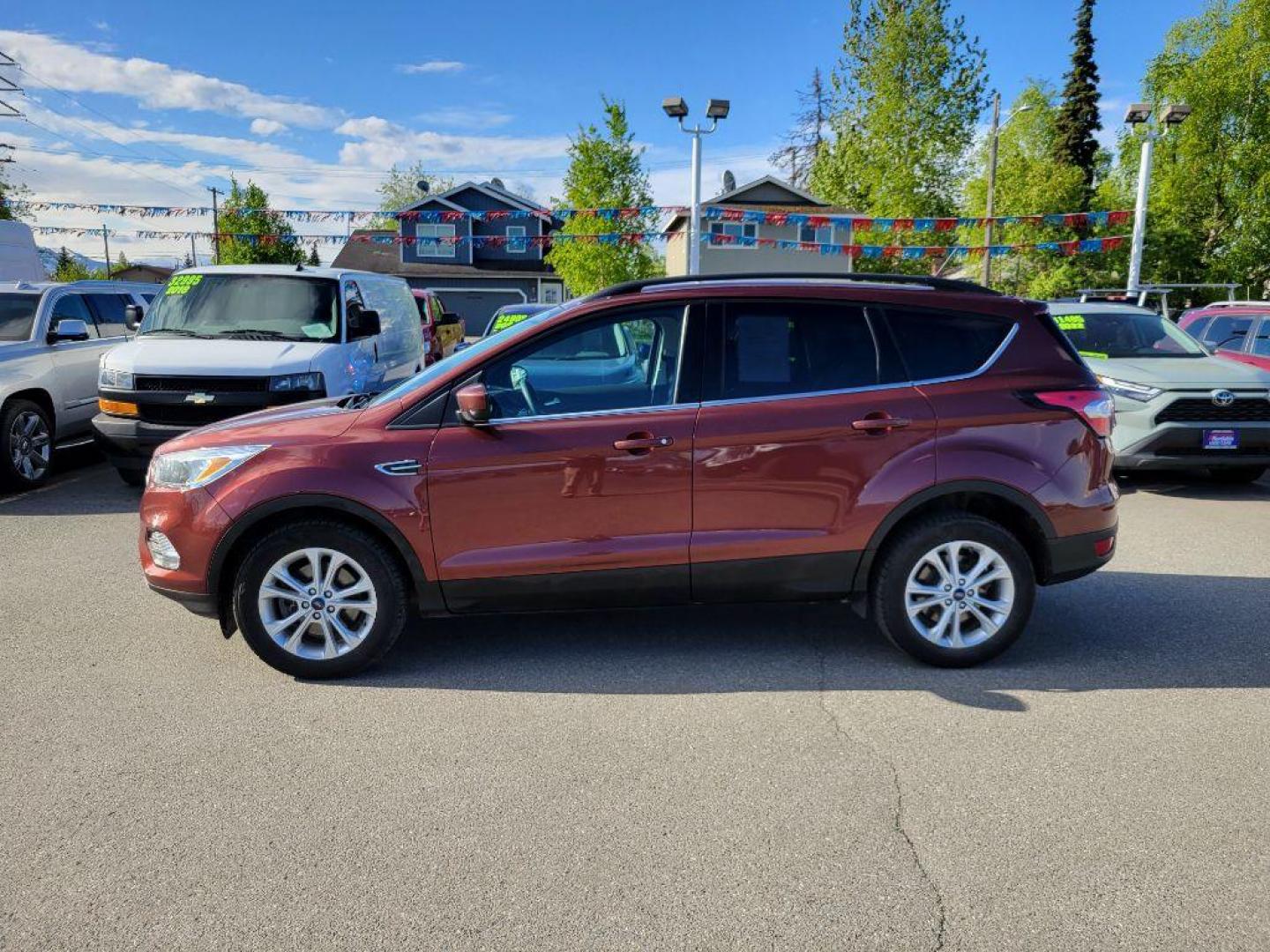 2018 MAROON FORD ESCAPE SE (1FMCU9GD5JU) with an 1.5L engine, Automatic transmission, located at 929 East 8th Ave, Anchorage, AK, 99501, (907) 274-2277, 61.214783, -149.866074 - Photo#1