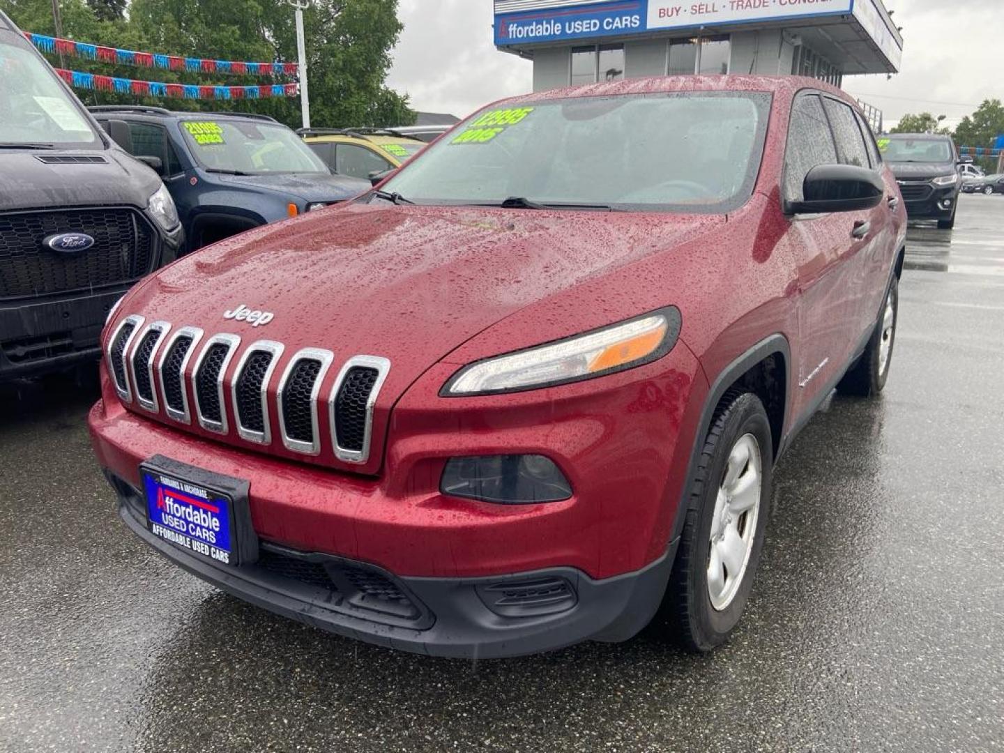 2015 RED JEEP CHEROKEE SPORT (1C4PJMAB7FW) with an 2.4L engine, Automatic transmission, located at 929 East 8th Ave, Anchorage, AK, 99501, (907) 274-2277, 61.214783, -149.866074 - Photo#0