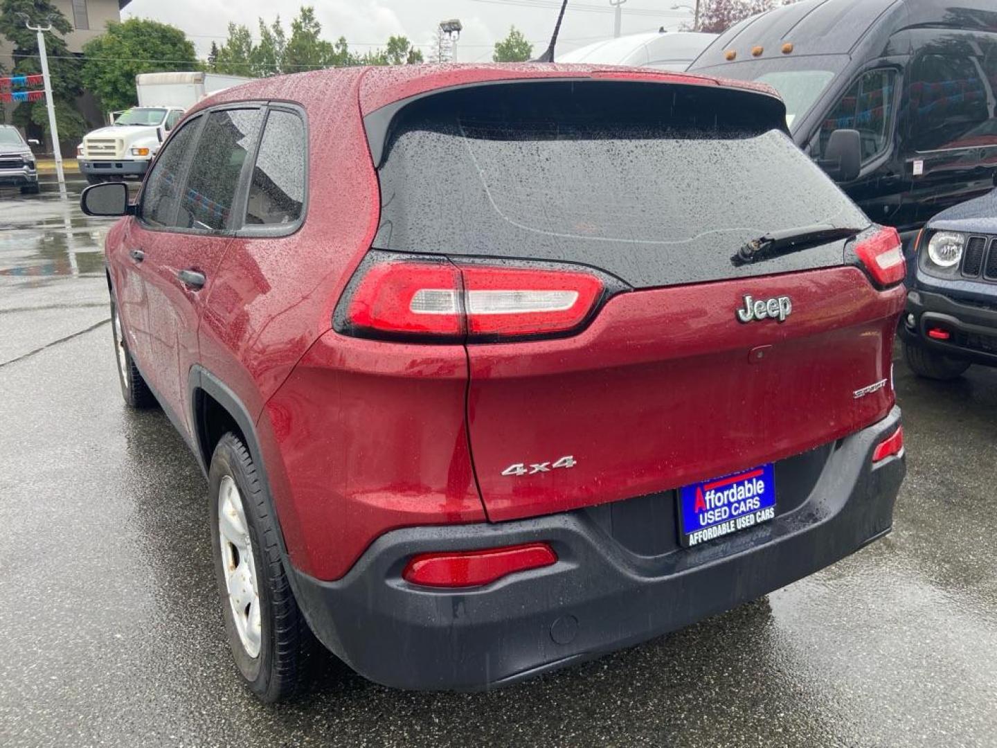 2015 RED JEEP CHEROKEE SPORT (1C4PJMAB7FW) with an 2.4L engine, Automatic transmission, located at 929 East 8th Ave, Anchorage, AK, 99501, (907) 274-2277, 61.214783, -149.866074 - Photo#2