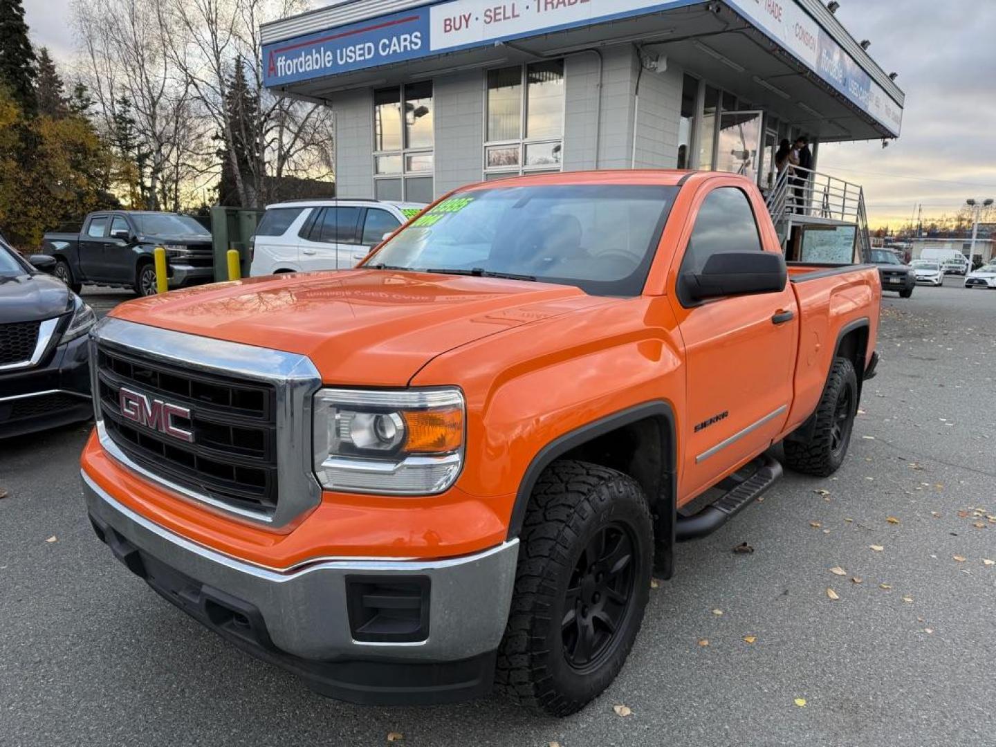 2014 ORANGE GMC SIERRA 1500 (1GTN2TEC5EZ) with an 5.3L engine, Automatic transmission, located at 929 East 8th Ave, Anchorage, AK, 99501, (907) 274-2277, 61.214783, -149.866074 - Photo#0