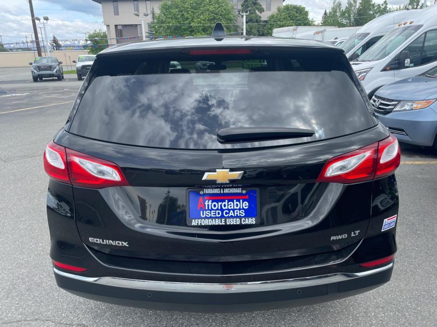 2018 BLACK CHEVROLET EQUINOX LT (2GNAXSEVXJ6) with an 1.5L engine, Automatic transmission, located at 929 East 8th Ave, Anchorage, AK, 99501, (907) 274-2277, 61.214783, -149.866074 - Photo#2