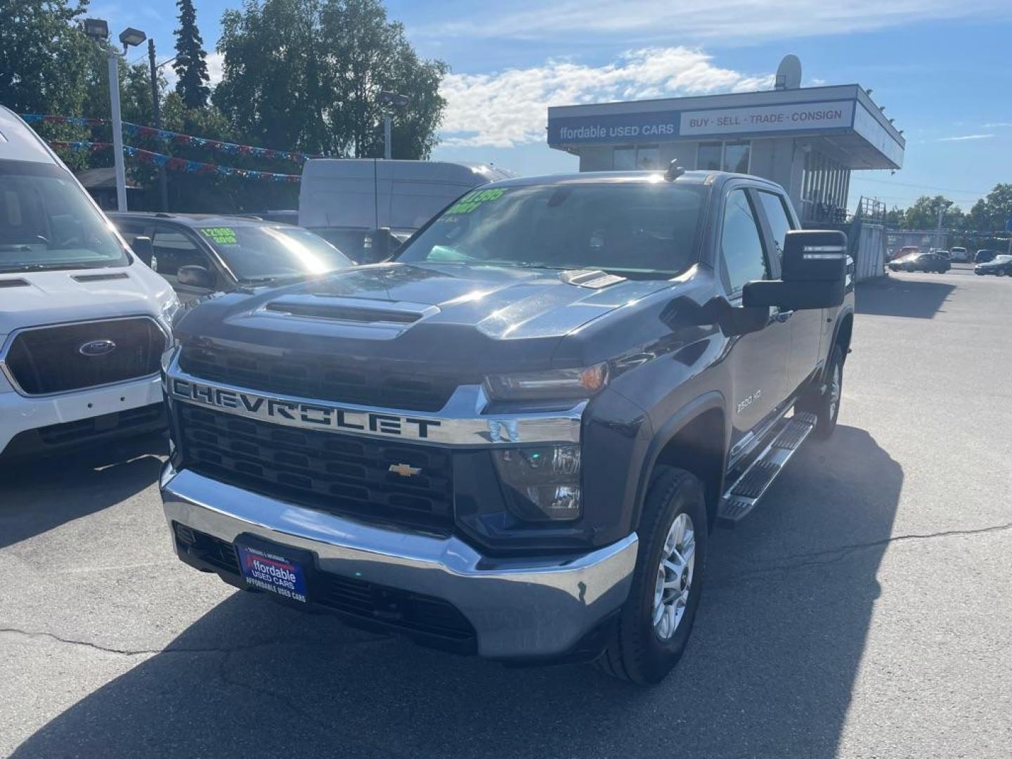 2021 BLUE CHEVROLET SILVERADO 2500 HEAVY DUTY LT (1GC4YNE72MF) with an 6.6L engine, Automatic transmission, located at 929 East 8th Ave, Anchorage, AK, 99501, (907) 274-2277, 61.214783, -149.866074 - Photo#0