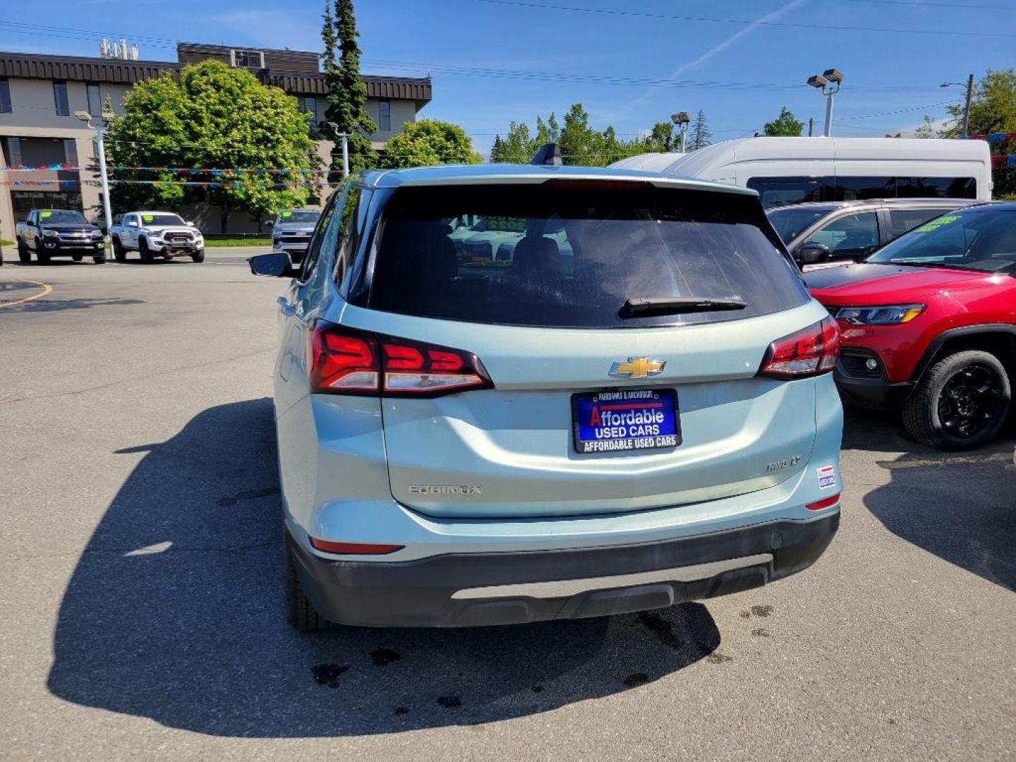 2022 BLUE CHEVROLET EQUINOX LT (2GNAXUEV7N6) with an 1.5L engine, Automatic transmission, located at 929 East 8th Ave, Anchorage, AK, 99501, (907) 274-2277, 61.214783, -149.866074 - Photo#2