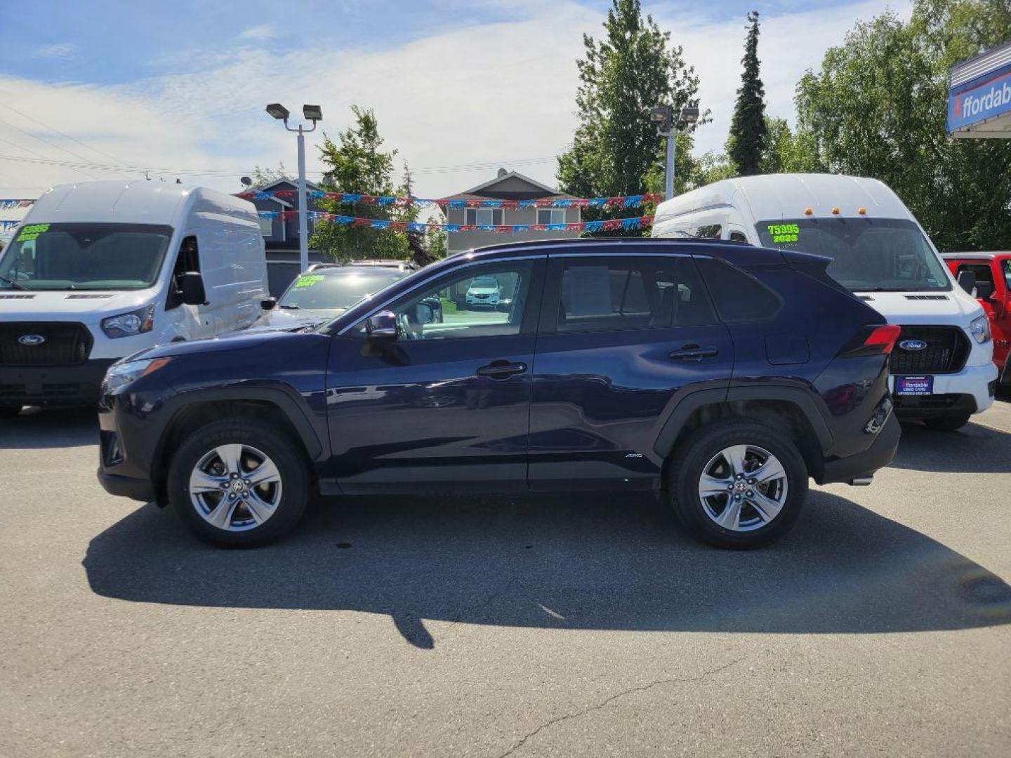 2022 BLUE TOYOTA RAV4 XLE HYBRID XLE (4T3RWRFVXNU) with an 2.5L engine, Automatic transmission, located at 929 East 8th Ave, Anchorage, AK, 99501, (907) 274-2277, 61.214783, -149.866074 - Photo#1