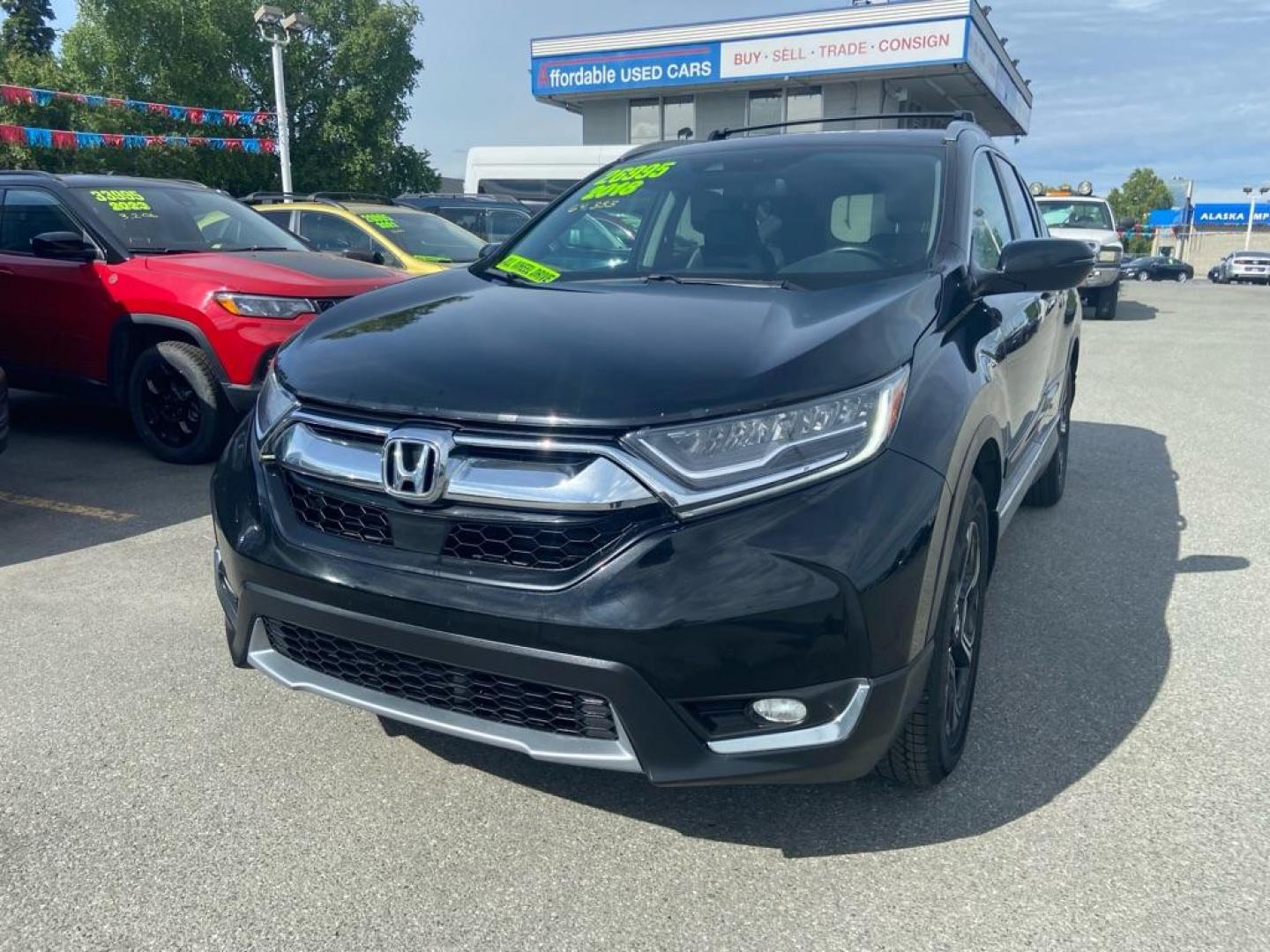 2018 BLACK HONDA CR-V TOURING (2HKRW2H99JH) with an 1.5L engine, Continuously Variable transmission, located at 929 East 8th Ave, Anchorage, AK, 99501, (907) 274-2277, 61.214783, -149.866074 - Photo#0