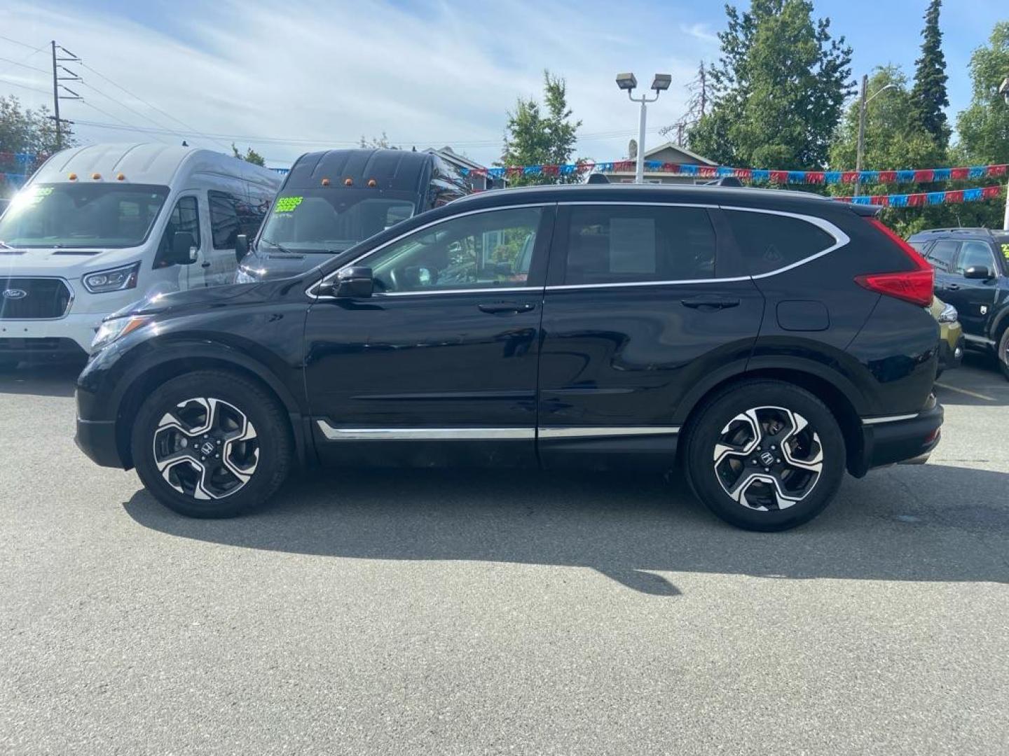 2018 BLACK HONDA CR-V TOURING (2HKRW2H99JH) with an 1.5L engine, Continuously Variable transmission, located at 929 East 8th Ave, Anchorage, AK, 99501, (907) 274-2277, 61.214783, -149.866074 - Photo#1