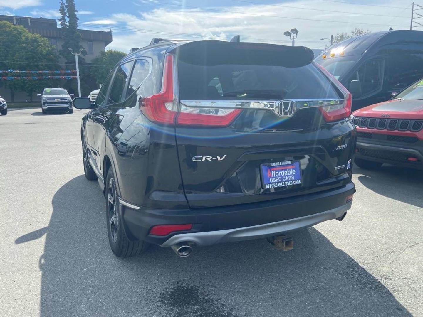 2018 BLACK HONDA CR-V TOURING (2HKRW2H99JH) with an 1.5L engine, Continuously Variable transmission, located at 929 East 8th Ave, Anchorage, AK, 99501, (907) 274-2277, 61.214783, -149.866074 - Photo#2