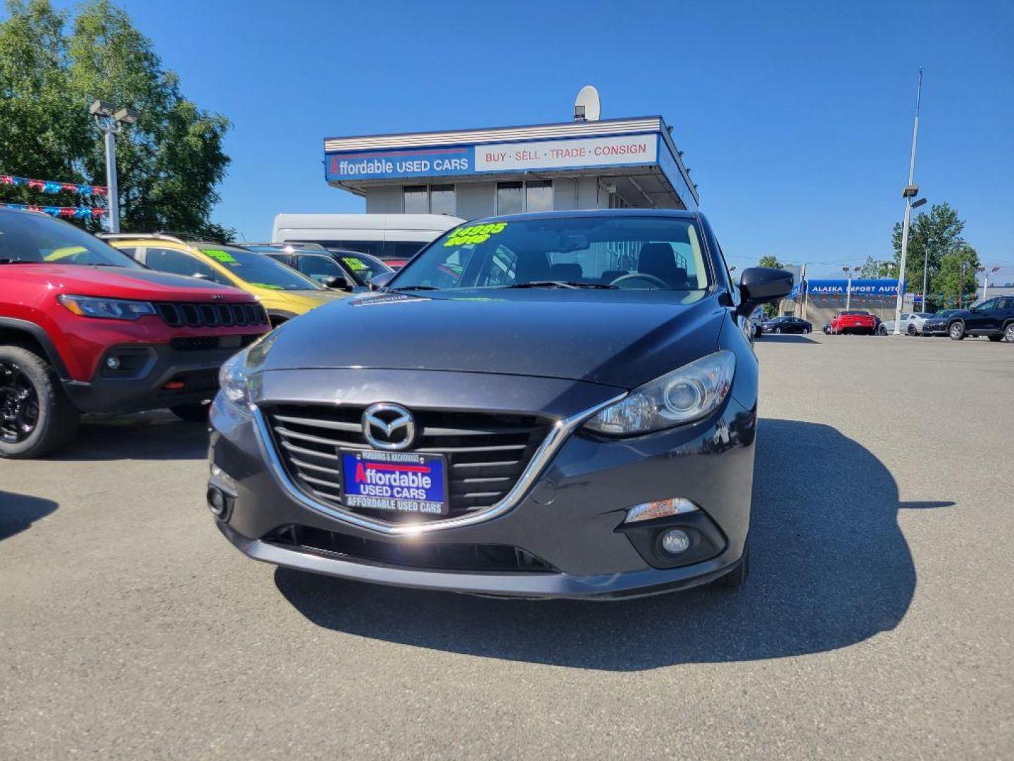 2016 GRAY MAZDA 3 TOURING (JM1BM1W76G1) with an 2.0L engine, 6-Speed Manual transmission, located at 929 East 8th Ave, Anchorage, AK, 99501, (907) 274-2277, 61.214783, -149.866074 - Photo#0