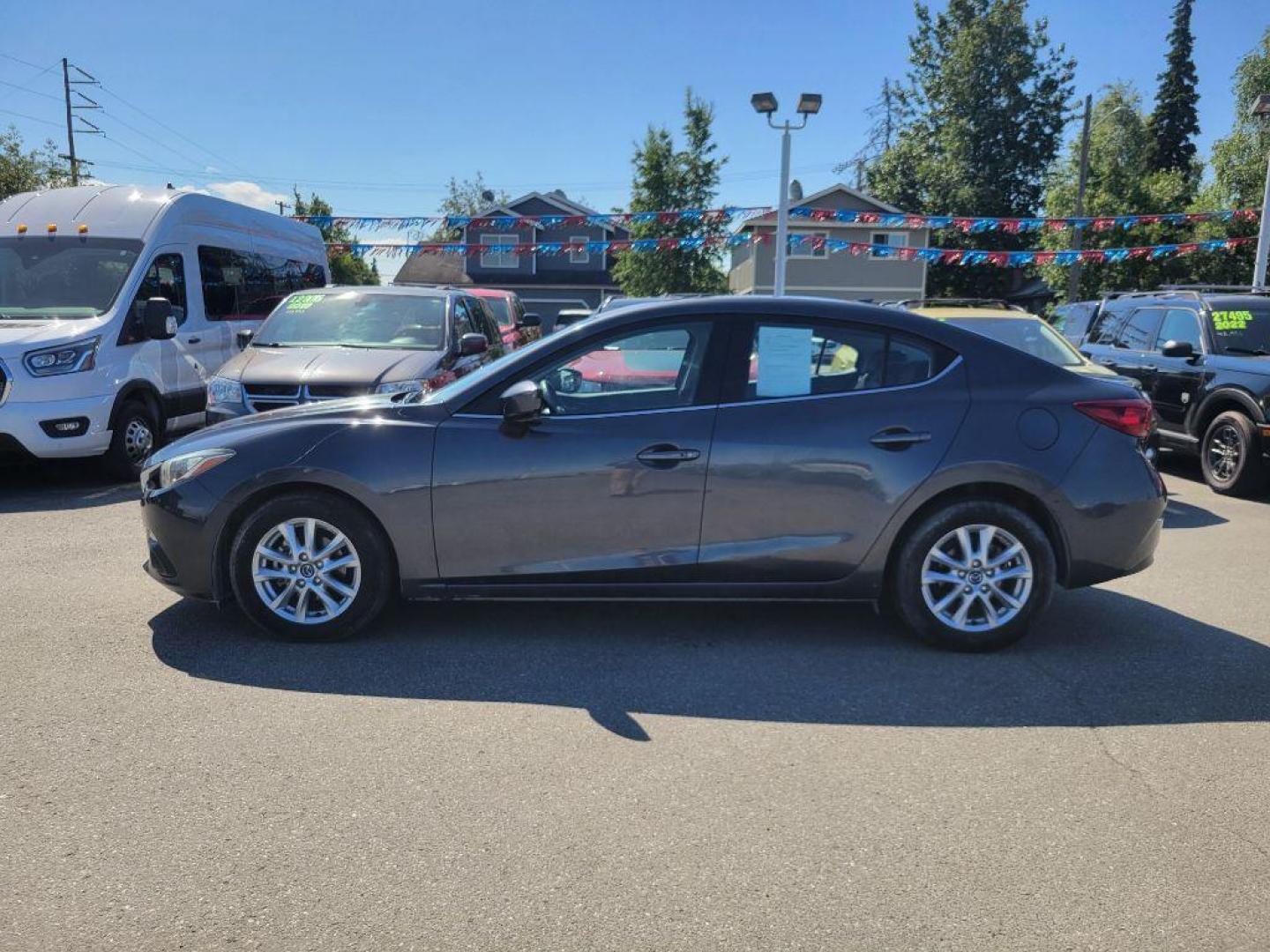 2016 GRAY MAZDA 3 TOURING (JM1BM1W76G1) with an 2.0L engine, 6-Speed Manual transmission, located at 929 East 8th Ave, Anchorage, AK, 99501, (907) 274-2277, 61.214783, -149.866074 - Photo#1