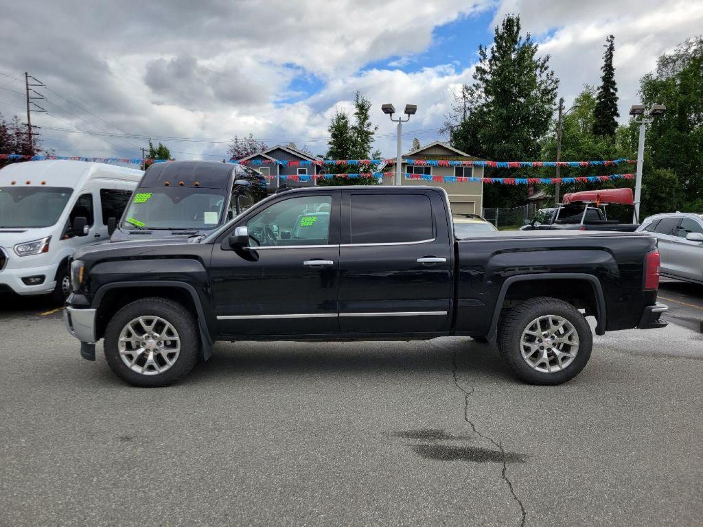 2015 BLACK GMC SIERRA 1500 SLT (3GTU2VEC0FG) with an 5.3L engine, Automatic transmission, located at 929 East 8th Ave, Anchorage, AK, 99501, (907) 274-2277, 61.214783, -149.866074 - Photo#1