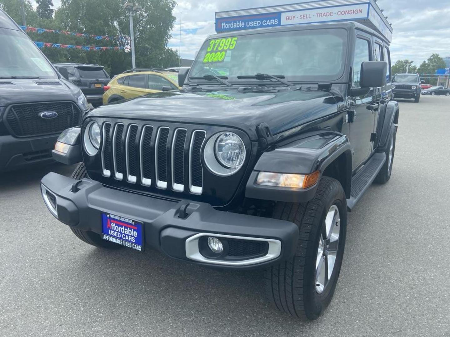 2020 BLACK JEEP WRANGLER UNLIMI SAHARA (1C4HJXEN8LW) with an 2.0L engine, Automatic transmission, located at 929 East 8th Ave, Anchorage, AK, 99501, (907) 274-2277, 61.214783, -149.866074 - Photo#0