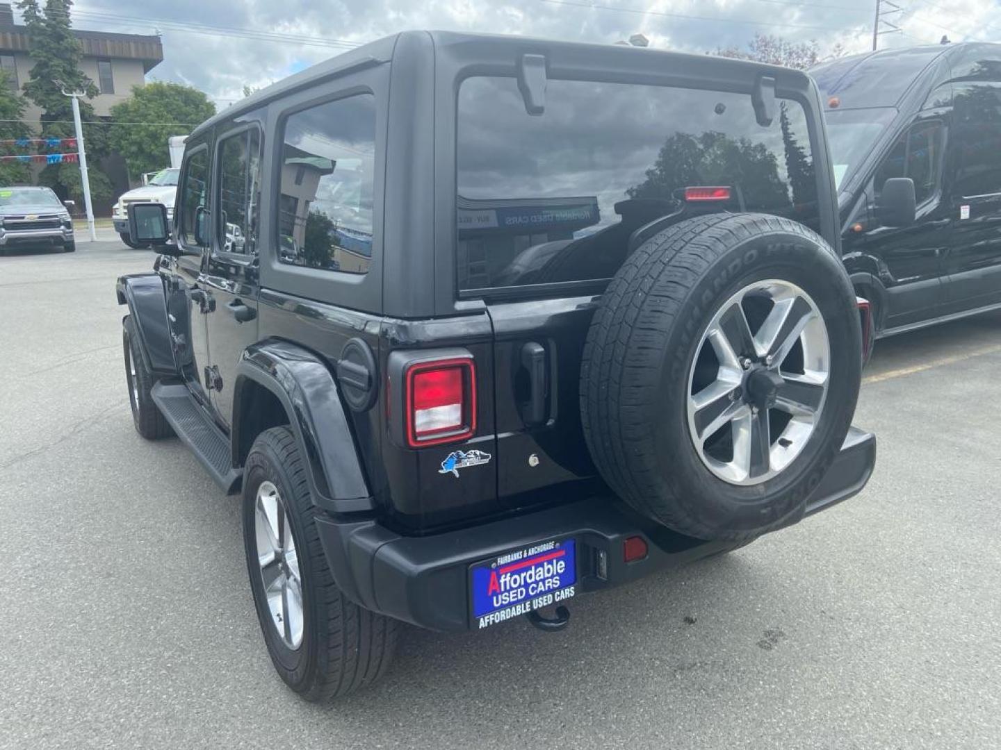 2020 BLACK JEEP WRANGLER UNLIMI SAHARA (1C4HJXEN8LW) with an 2.0L engine, Automatic transmission, located at 929 East 8th Ave, Anchorage, AK, 99501, (907) 274-2277, 61.214783, -149.866074 - Photo#2