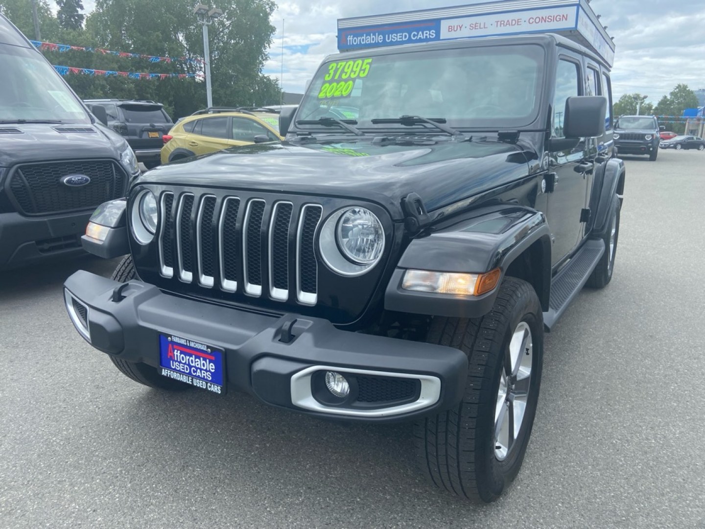 2020 BLACK JEEP WRANGLER UNLIMI SAHARA (1C4HJXEN8LW) with an 2.0L engine, Automatic transmission, located at 929 East 8th Ave, Anchorage, AK, 99501, (907) 274-2277, 61.214783, -149.866074- Photo#0