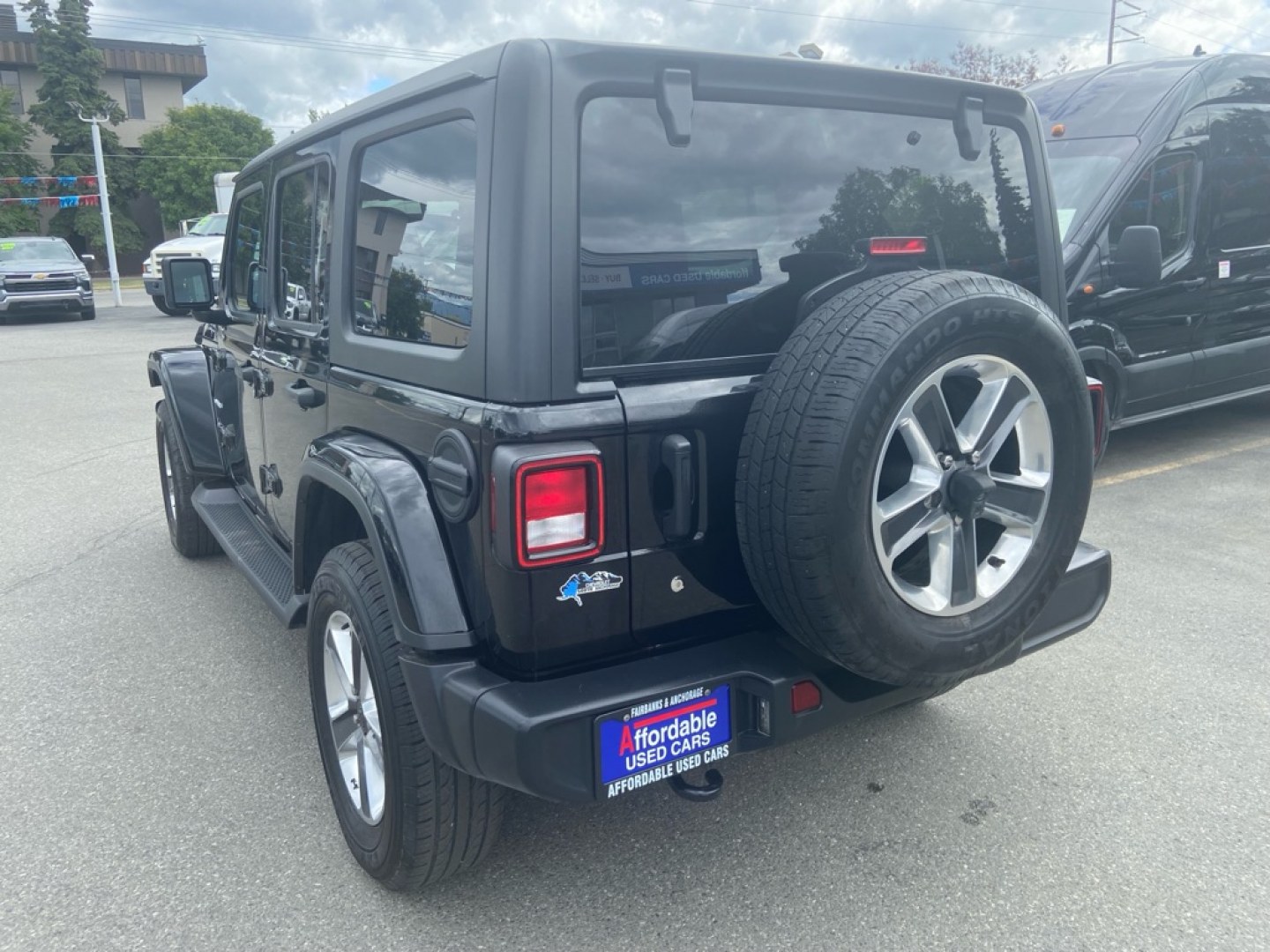 2020 BLACK JEEP WRANGLER UNLIMI SAHARA (1C4HJXEN8LW) with an 2.0L engine, Automatic transmission, located at 929 East 8th Ave, Anchorage, AK, 99501, (907) 274-2277, 61.214783, -149.866074- Photo#2