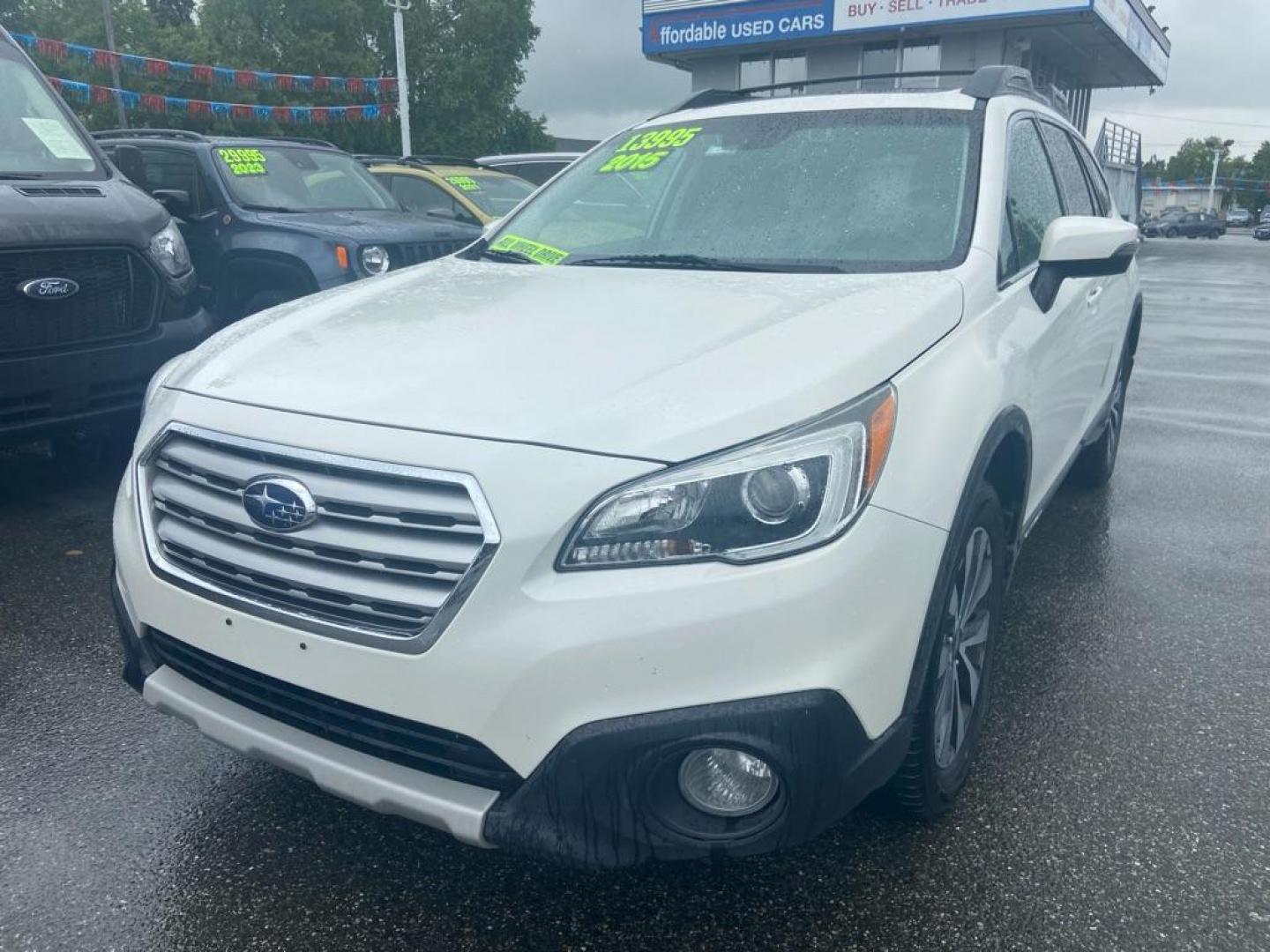 2015 WHITE SUBARU OUTBACK 2.5I LIMITED (4S4BSANC5F3) with an 2.5L engine, Continuously Variable transmission, located at 929 East 8th Ave, Anchorage, AK, 99501, (907) 274-2277, 61.214783, -149.866074 - Photo#0