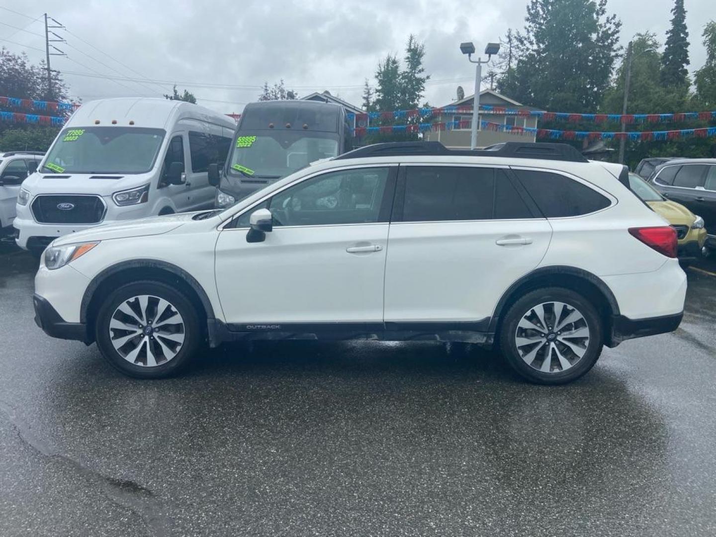 2015 WHITE SUBARU OUTBACK 2.5I LIMITED (4S4BSANC5F3) with an 2.5L engine, Continuously Variable transmission, located at 929 East 8th Ave, Anchorage, AK, 99501, (907) 274-2277, 61.214783, -149.866074 - Photo#1