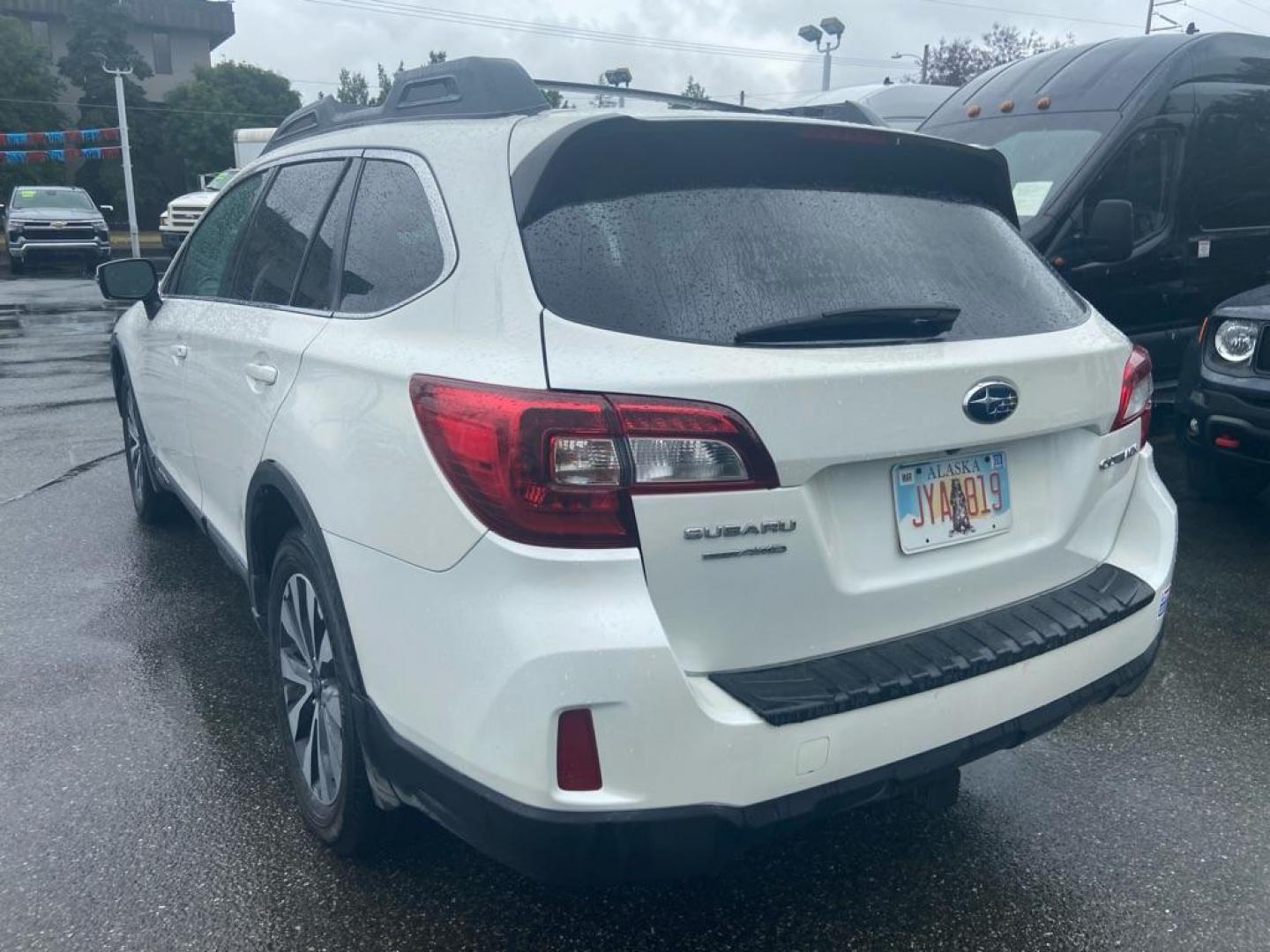 2015 WHITE SUBARU OUTBACK 2.5I LIMITED (4S4BSANC5F3) with an 2.5L engine, Continuously Variable transmission, located at 929 East 8th Ave, Anchorage, AK, 99501, (907) 274-2277, 61.214783, -149.866074 - Photo#2