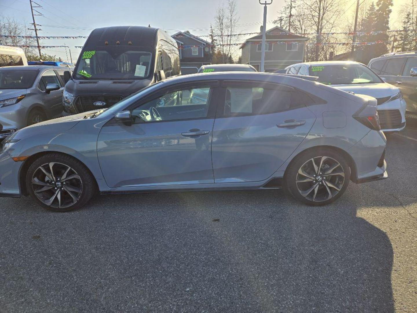 2019 BLUE HONDA CIVIC SPORT (SHHFK7G42KU) with an 1.5L engine, Continuously Variable transmission, located at 929 East 8th Ave, Anchorage, AK, 99501, (907) 274-2277, 61.214783, -149.866074 - Photo#1