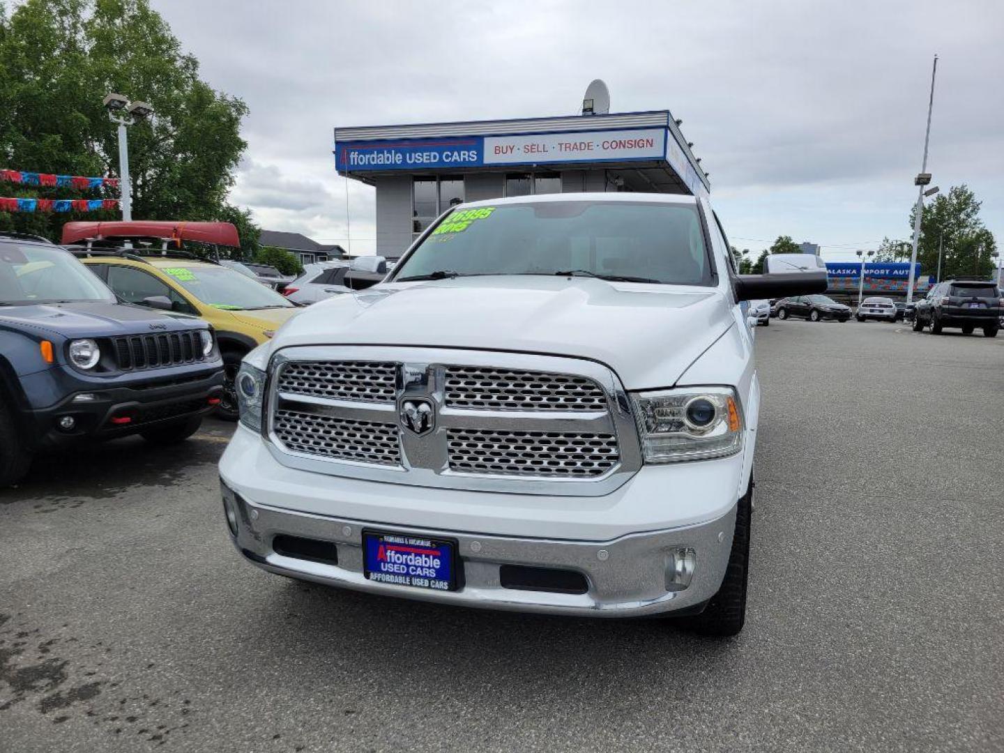 2015 WHITE RAM 1500 LARAMIE (1C6RR7VT3FS) with an 5.7L engine, Automatic transmission, located at 929 East 8th Ave, Anchorage, AK, 99501, (907) 274-2277, 61.214783, -149.866074 - Photo#0