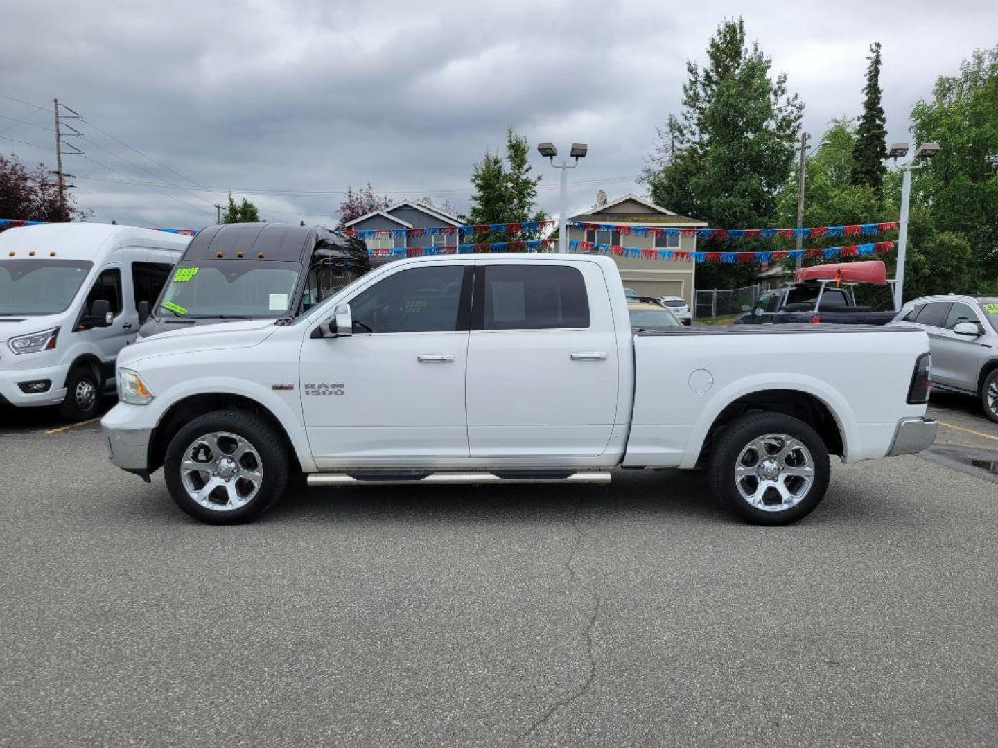 2015 WHITE RAM 1500 LARAMIE (1C6RR7VT3FS) with an 5.7L engine, Automatic transmission, located at 929 East 8th Ave, Anchorage, AK, 99501, (907) 274-2277, 61.214783, -149.866074 - Photo#1