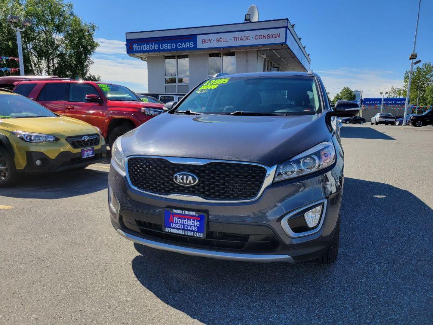 2016 GRY KIA SORENTO EX (5XYPHDA1XGG) with an 2.0L engine, Automatic transmission, located at 929 East 8th Ave, Anchorage, AK, 99501, (907) 274-2277, 61.214783, -149.866074 - Photo#0