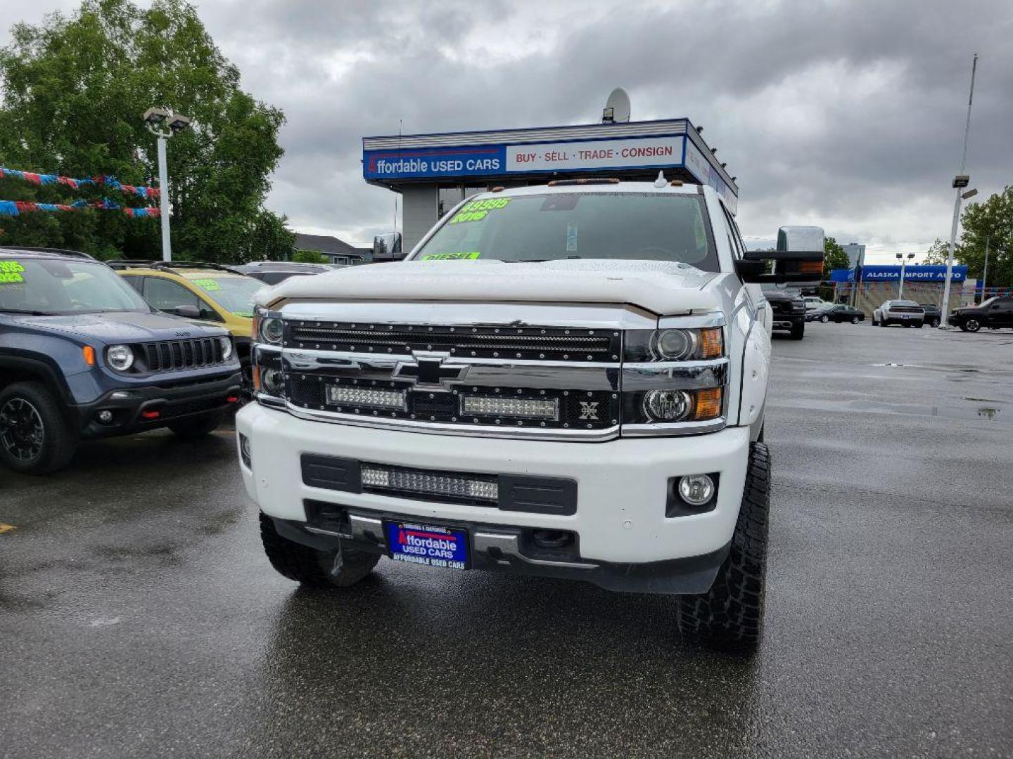 2016 WHITE CHEVROLET SILVERADO 2500 HIGH COUNTRY (1GC1KXE88GF) with an 6.6L engine, Automatic transmission, located at 929 East 8th Ave, Anchorage, AK, 99501, (907) 274-2277, 61.214783, -149.866074 - Photo#0